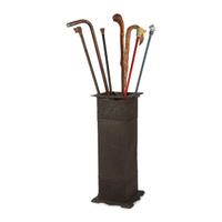 Seven Walking Sticks and a Cast Metal Umbrella Stand