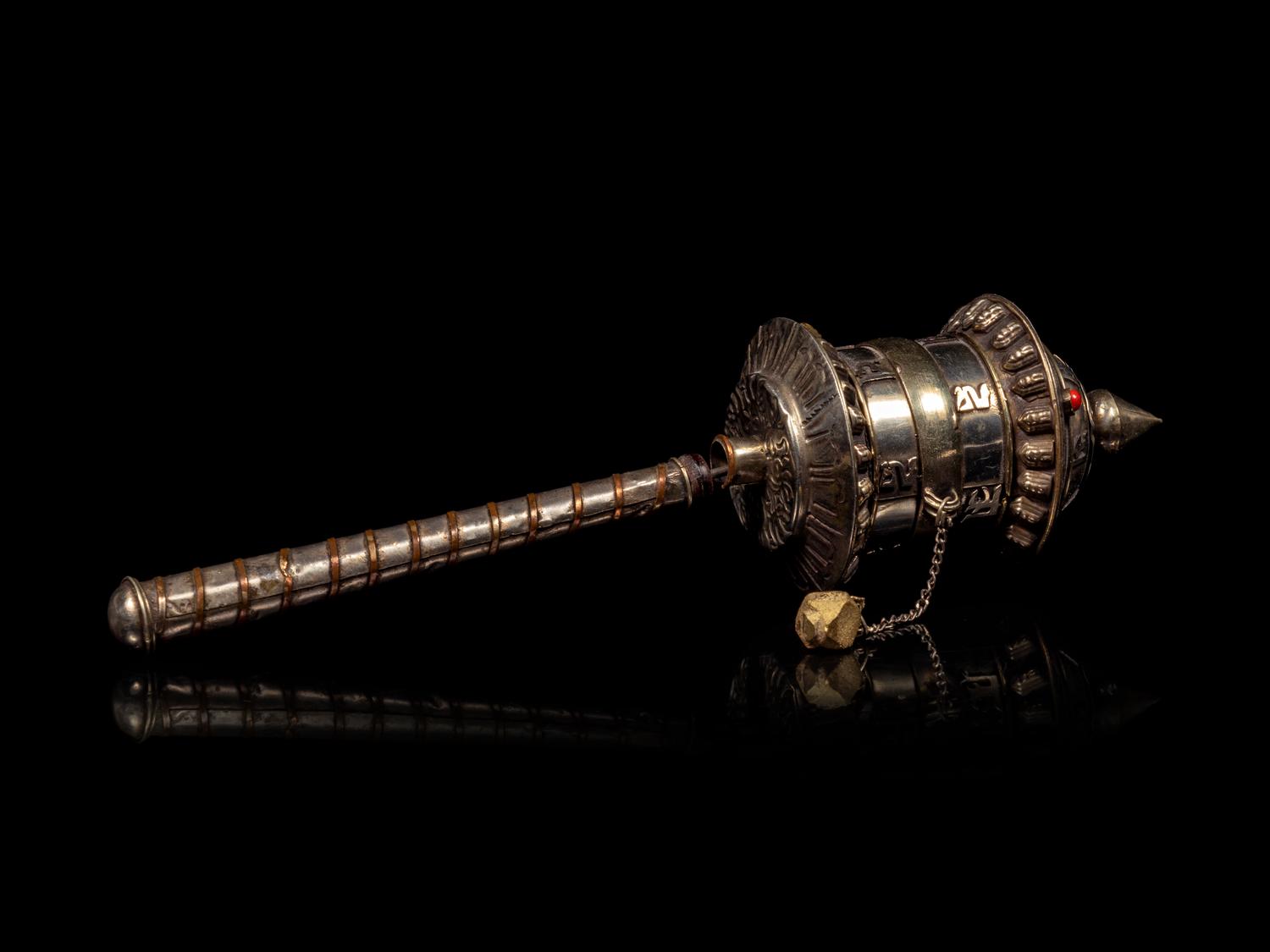 A Tibetan Silver Praying Wheel