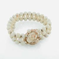 A Three Piece Collection of 14K Yellow Gold and Coral Jewelry