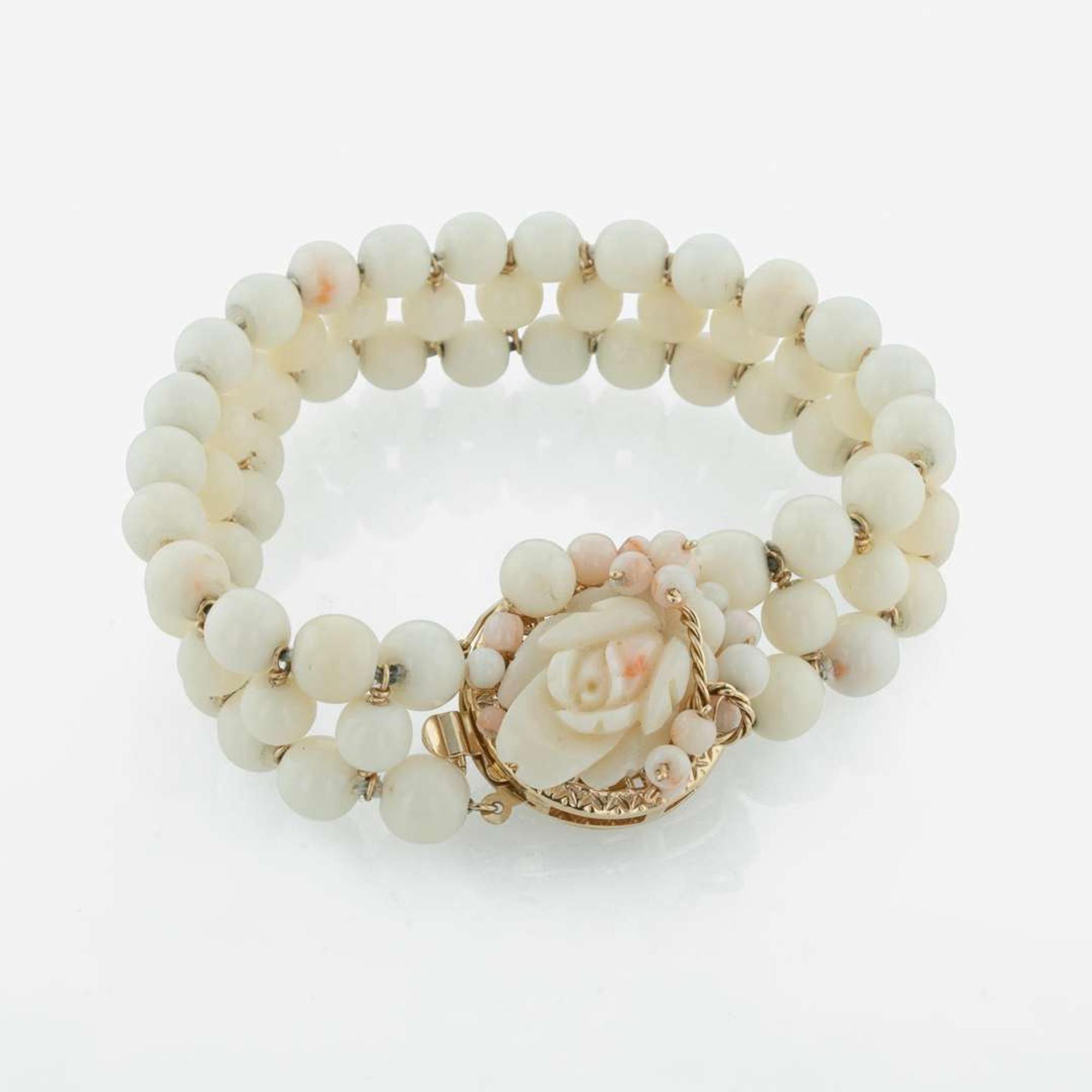 A Three Piece Collection of 14K Yellow Gold and Coral Jewelry