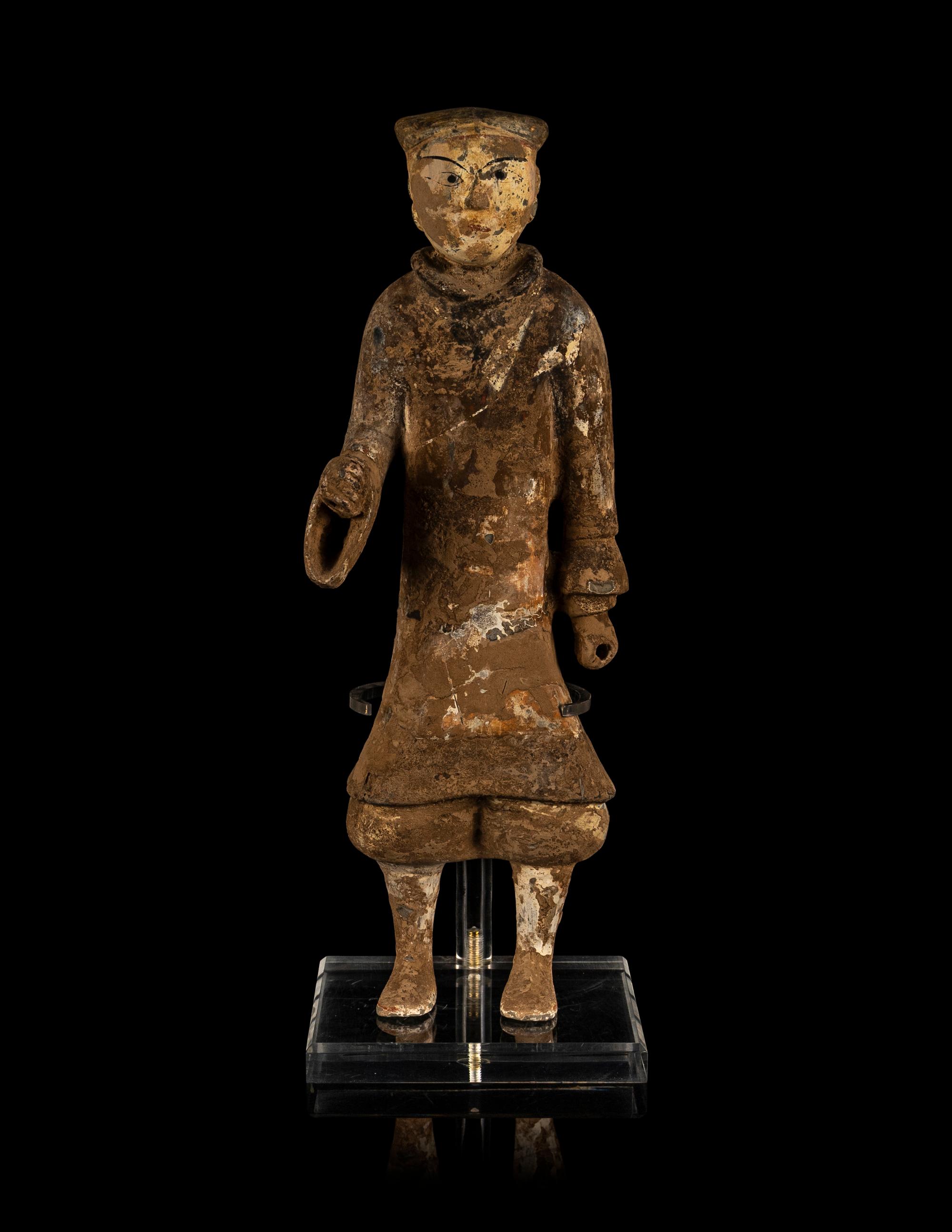 A Chinese Painted Grey Pottery Figure of a Figure