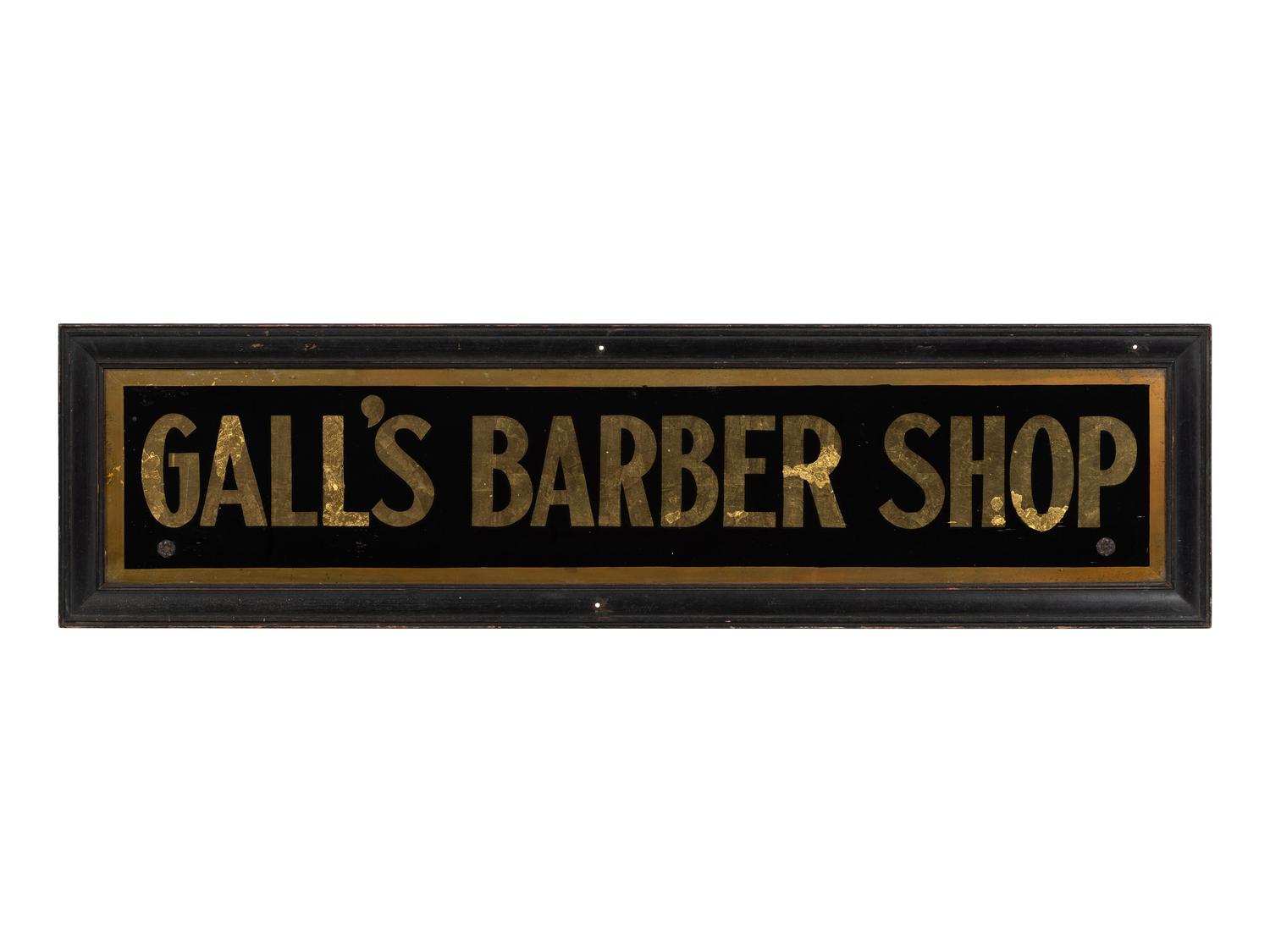 A Reverse Painted and Foil Decorated Barber Shop Sign