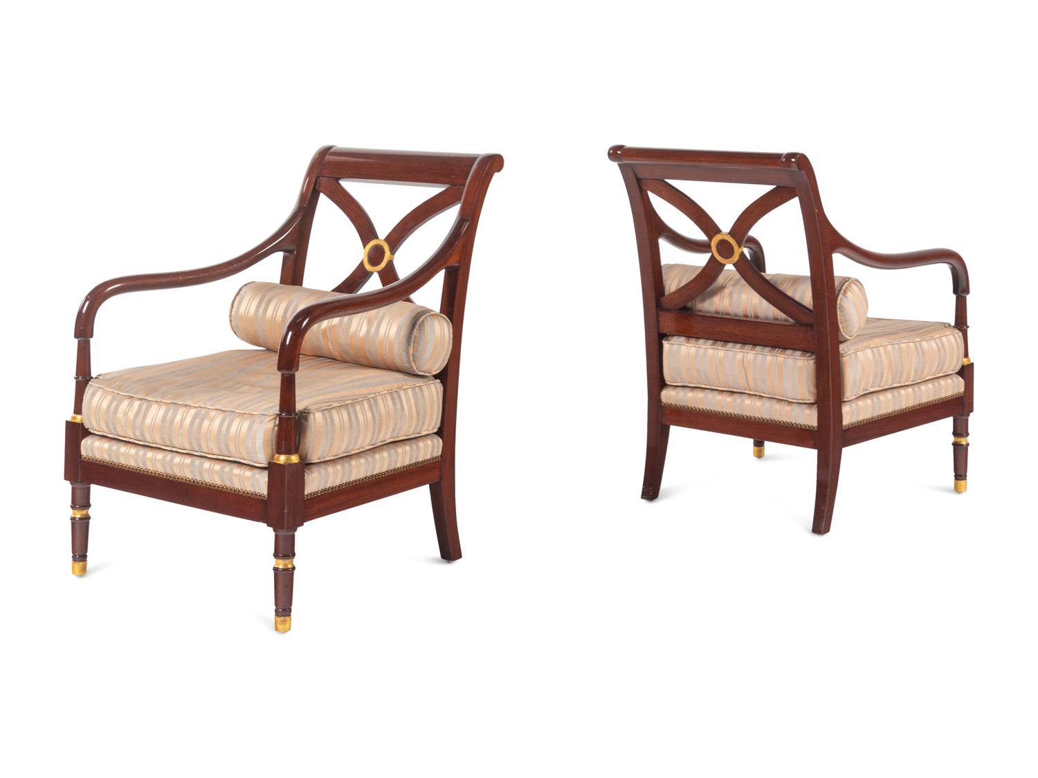 A Pair of Regency Style Parcel Gilt Armchairs