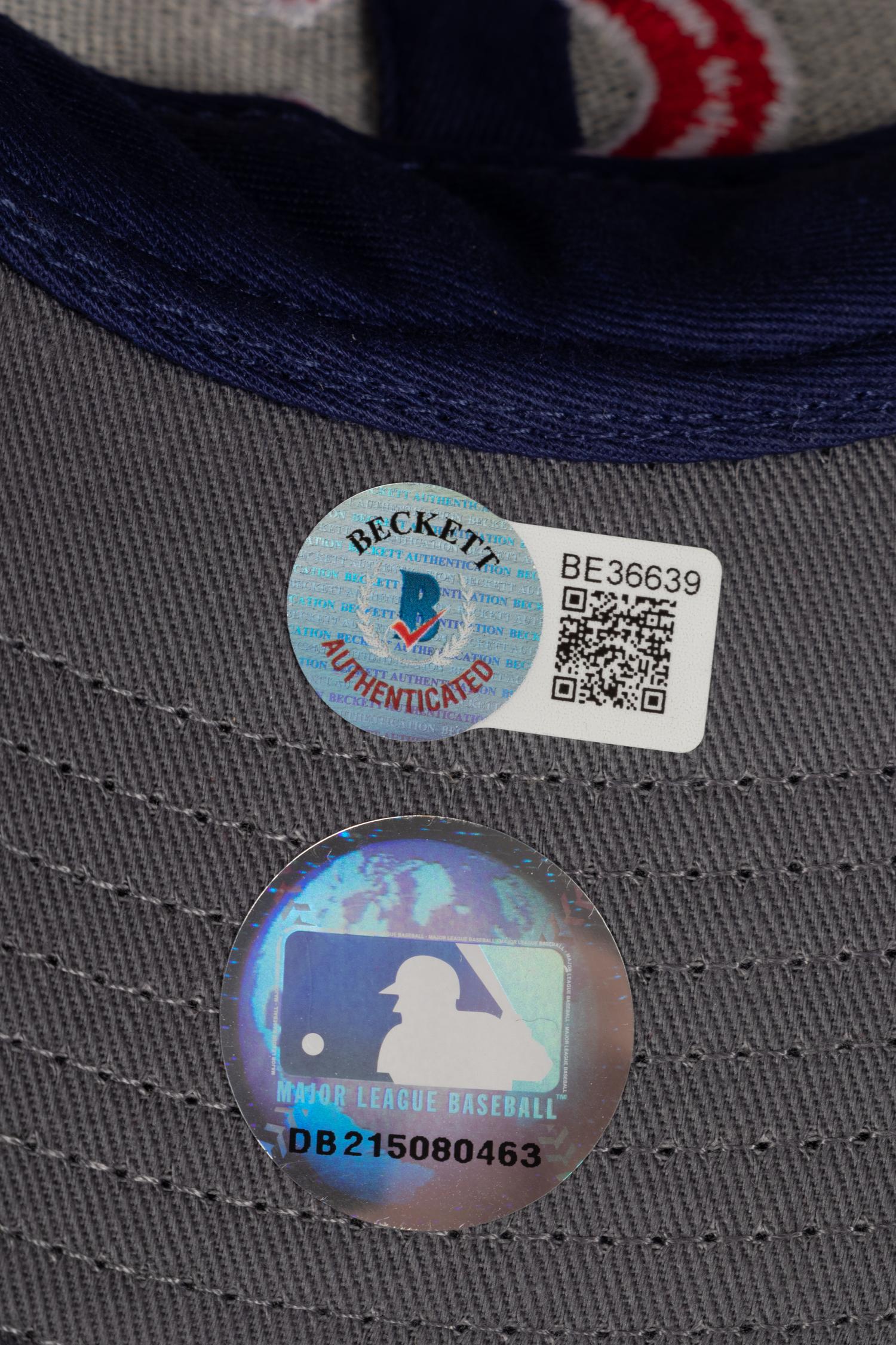 A Greg Maddux Signed Baseball, Chicago Cubs and Atlanta Braves Hats (Beckett Authentication Services BAS Certified),