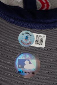 A Greg Maddux Signed Baseball, Chicago Cubs and Atlanta Braves Hats (Beckett Authentication Services BAS Certified),