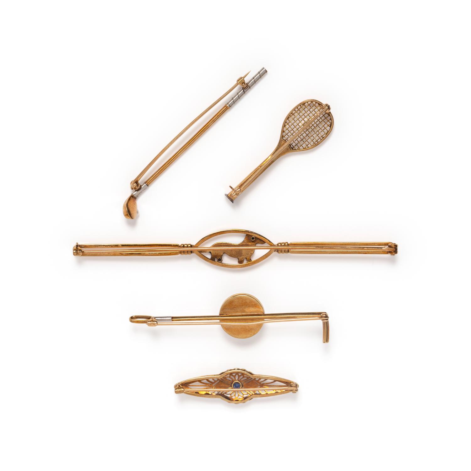 COLLECTION OF GOLD BROOCHES