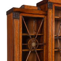 A Regency Mahogany, Ormolu-Mounted and Part Ebonized Breakfront Bookcase