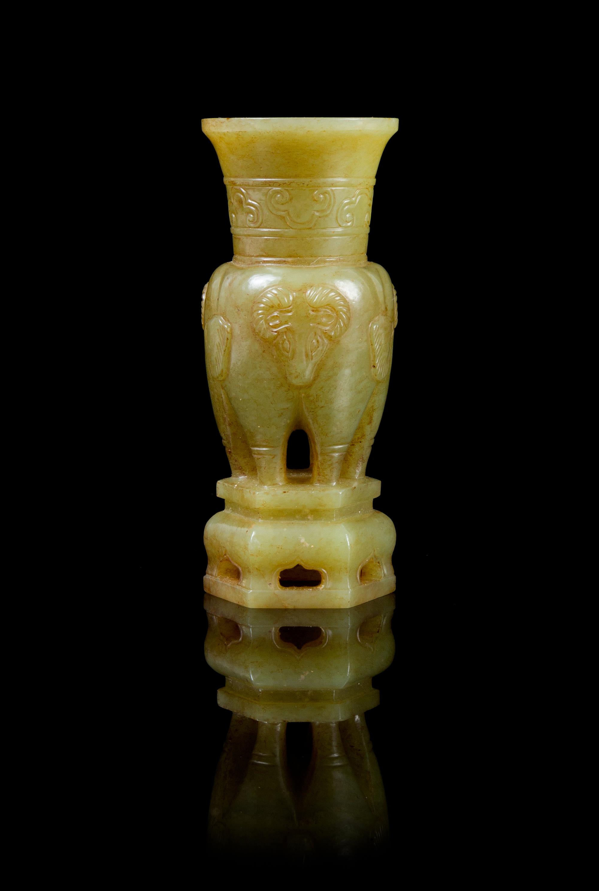 A Carved Yellow Jade Vase Height 3 3/4 inches.