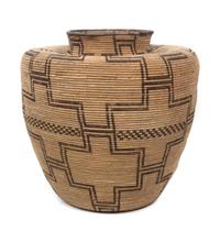 An Apache Basketry Jar Height 15 x diameter 16 inches.