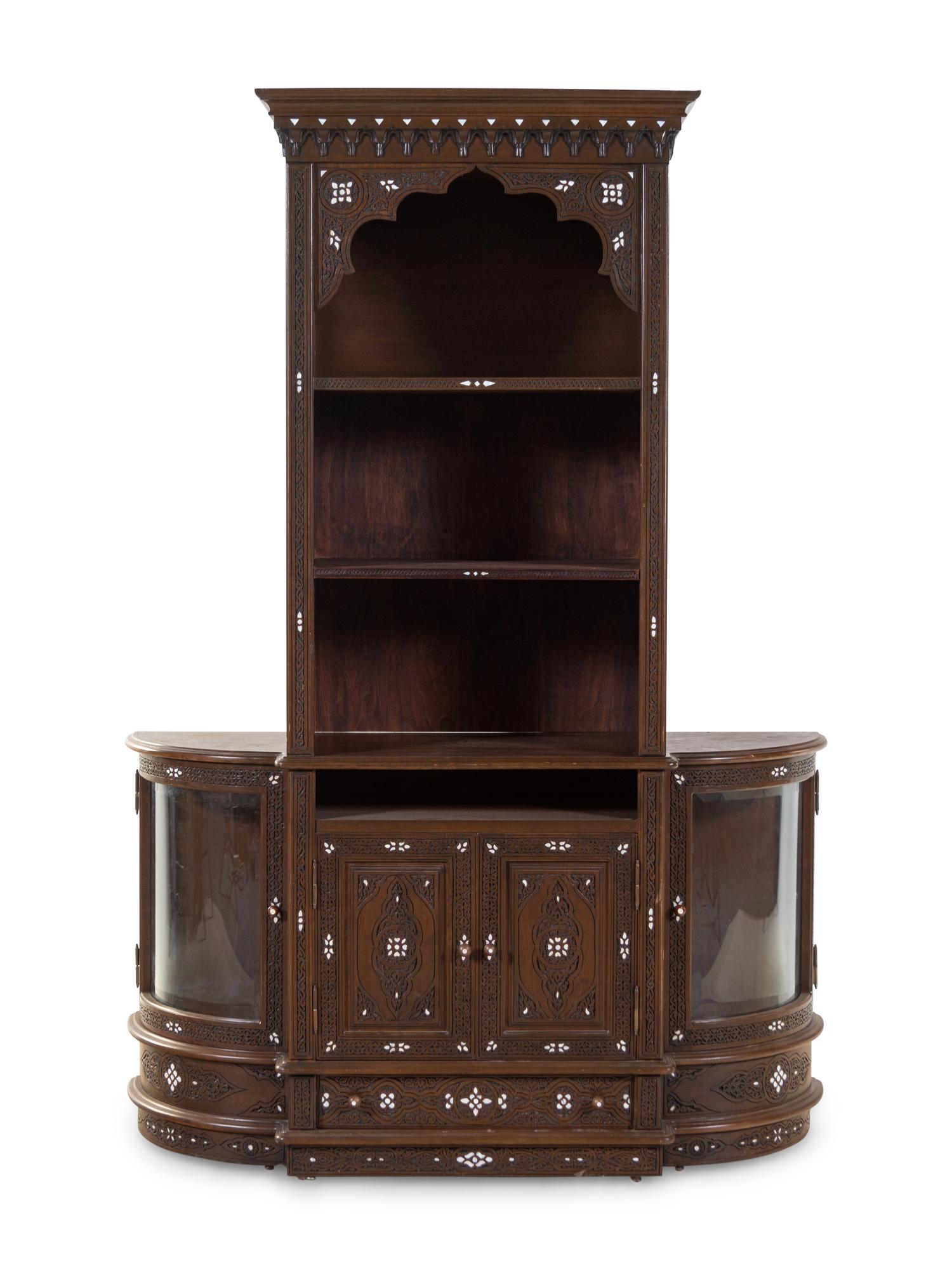 A Syrian Mother-of-Pearl Inlaid and Carved Walnut Bookcase