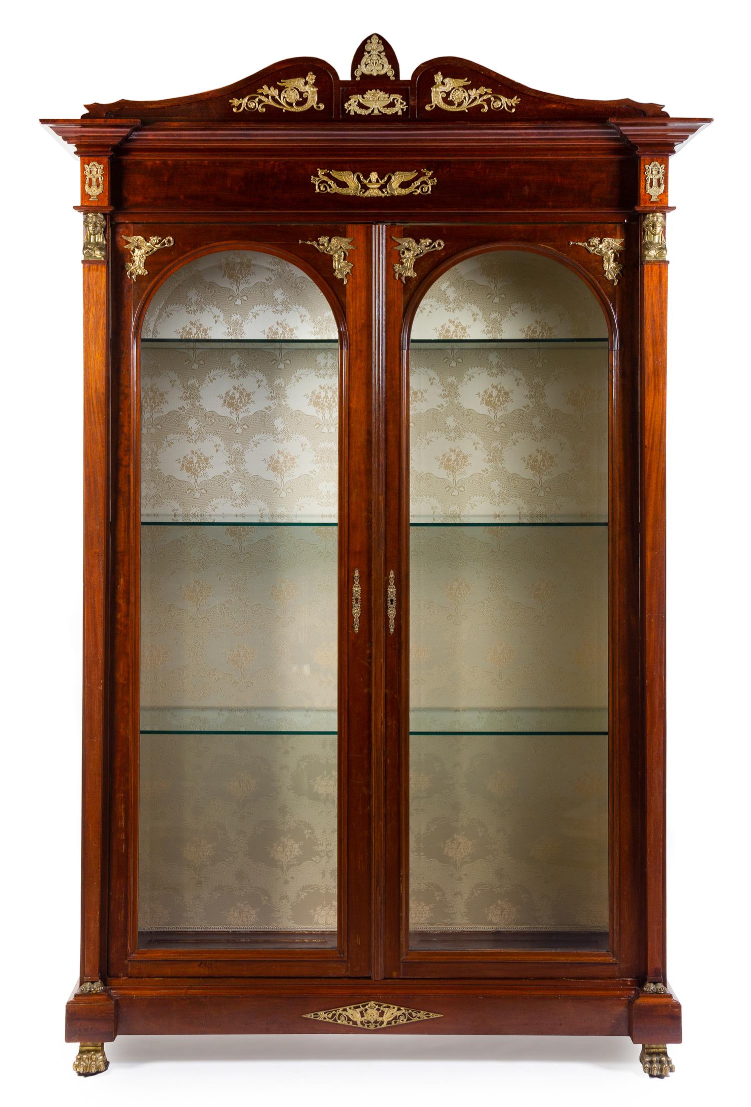 An Empire Style Gilt Bronze Mounted Mahogany Vitrine Cabinet Height 99 x width 58 x depth 23 inches. — LATE 19TH CENTURY