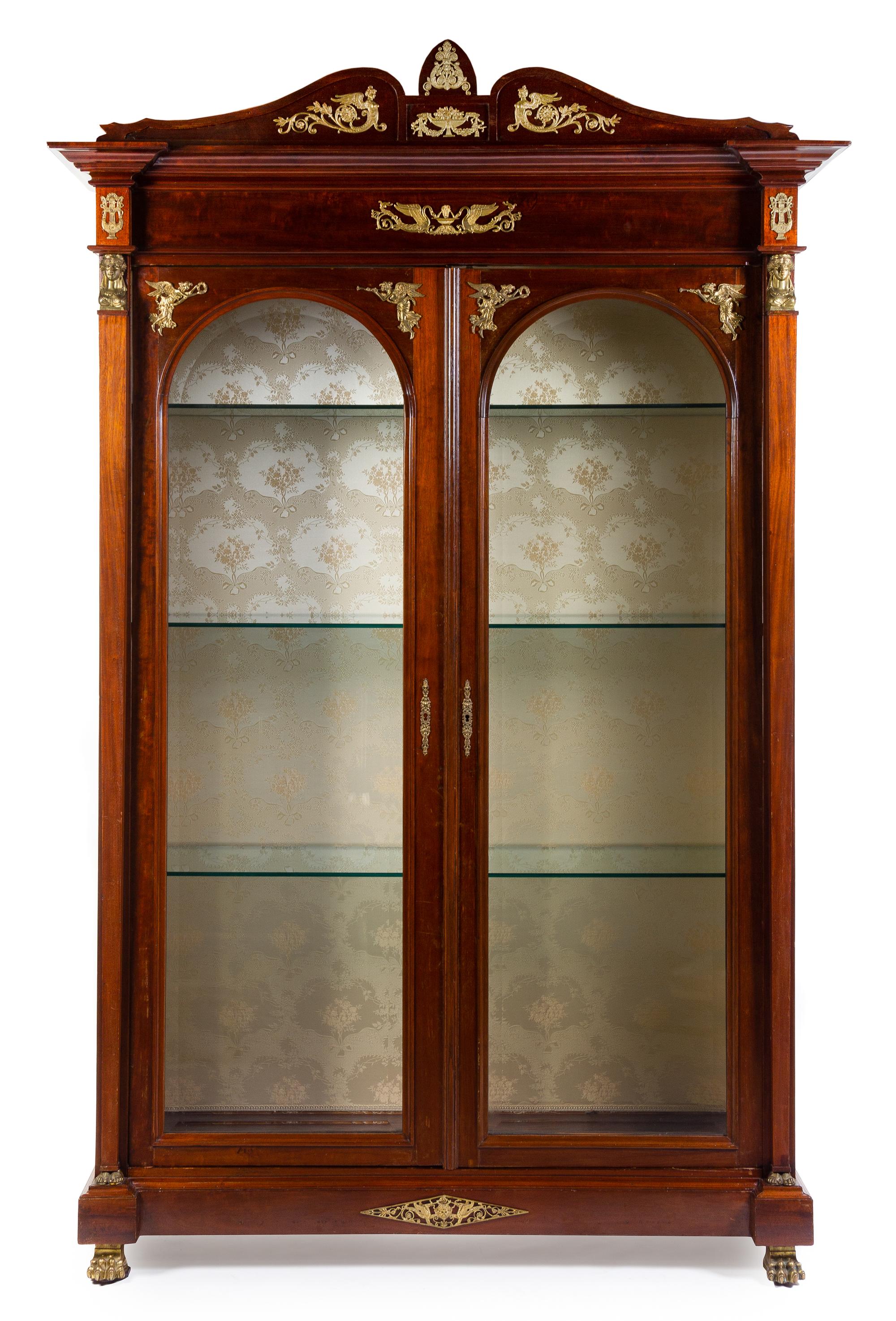 An Empire Style Gilt Bronze Mounted Mahogany Vitrine Cabinet Height 99 x width 58 x depth 23 inches. — LATE 19TH CENTURY