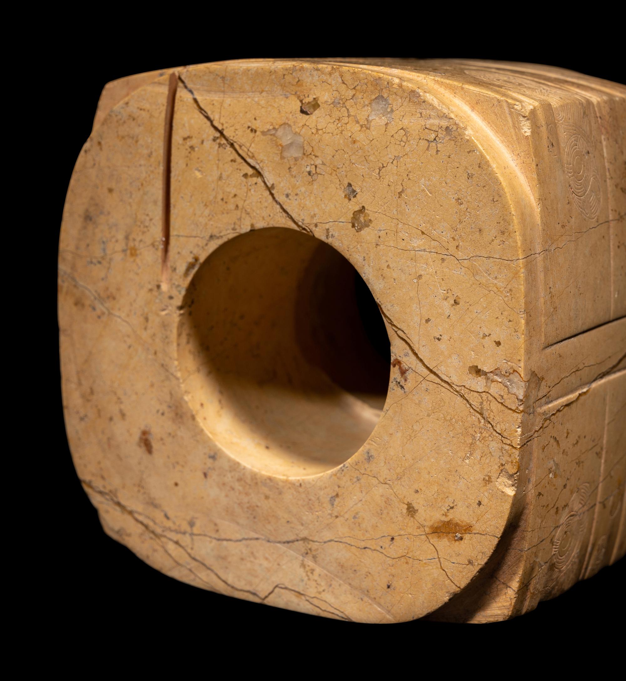 A Chinese Archaistic Chicken Bone Jade Cong