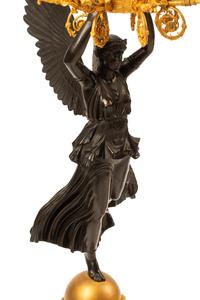 A Pair of Monumental Empire Style Gilt and Patinated Metal Seven-Light Figural Candelabra