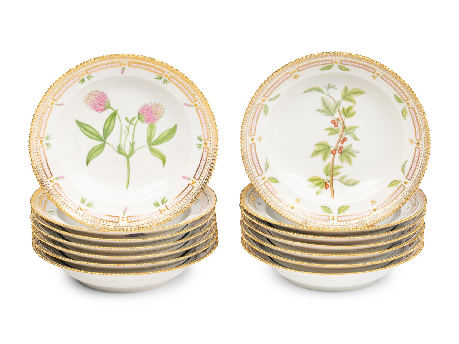 A Set of Fourteen Royal Copenhagen Flora Danica Porcelain Soup Plates