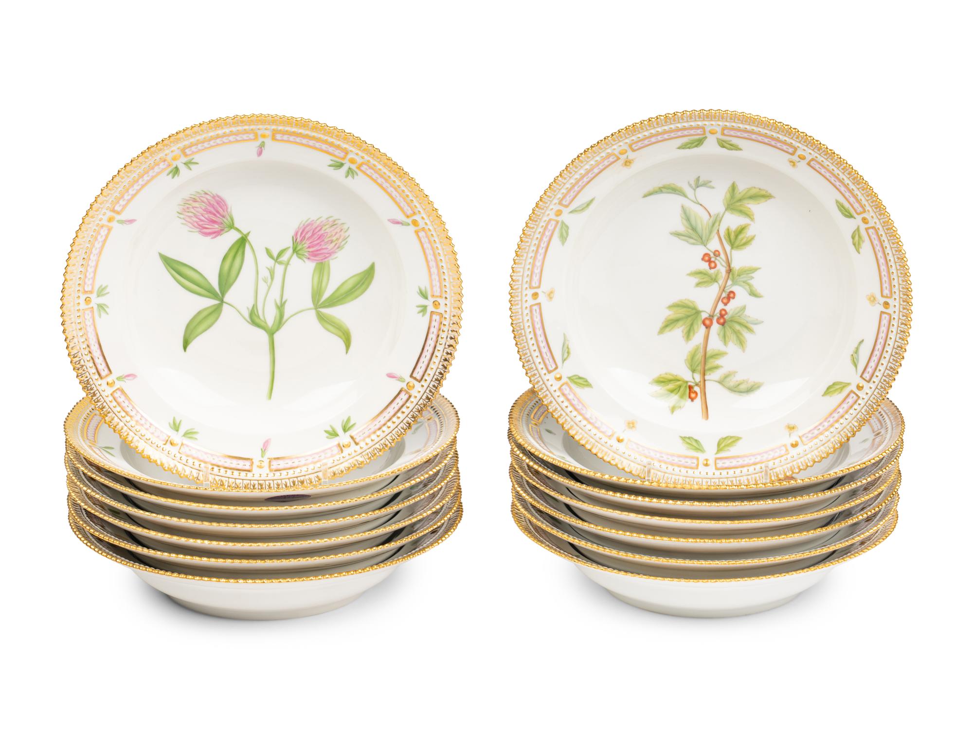 A Set of Fourteen Royal Copenhagen Flora Danica Porcelain Soup Plates