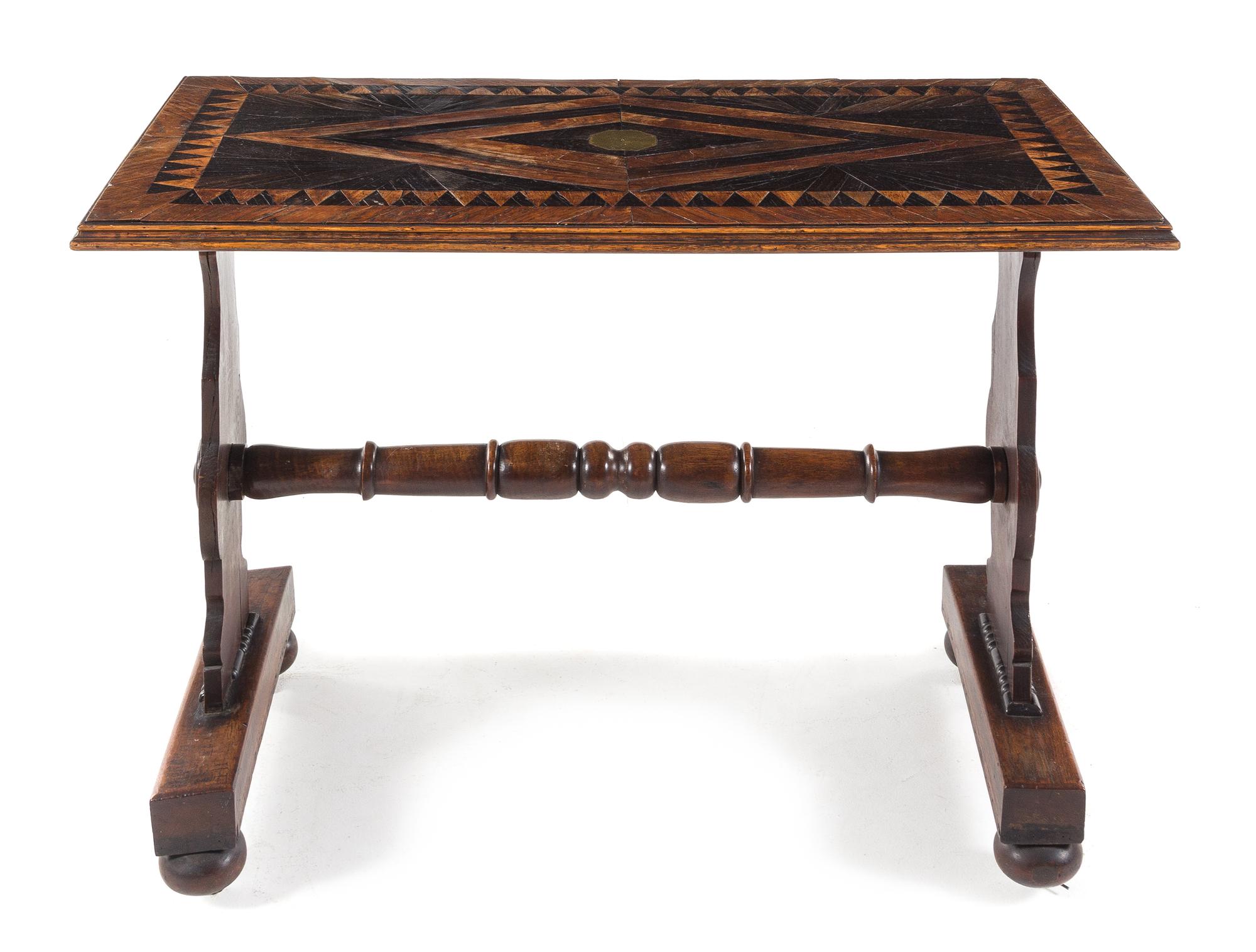 An English Parquetry Shipwreck Table Height 29 1/2 x width 43 x depth 22 1/2 inches. — 19TH CENTURY