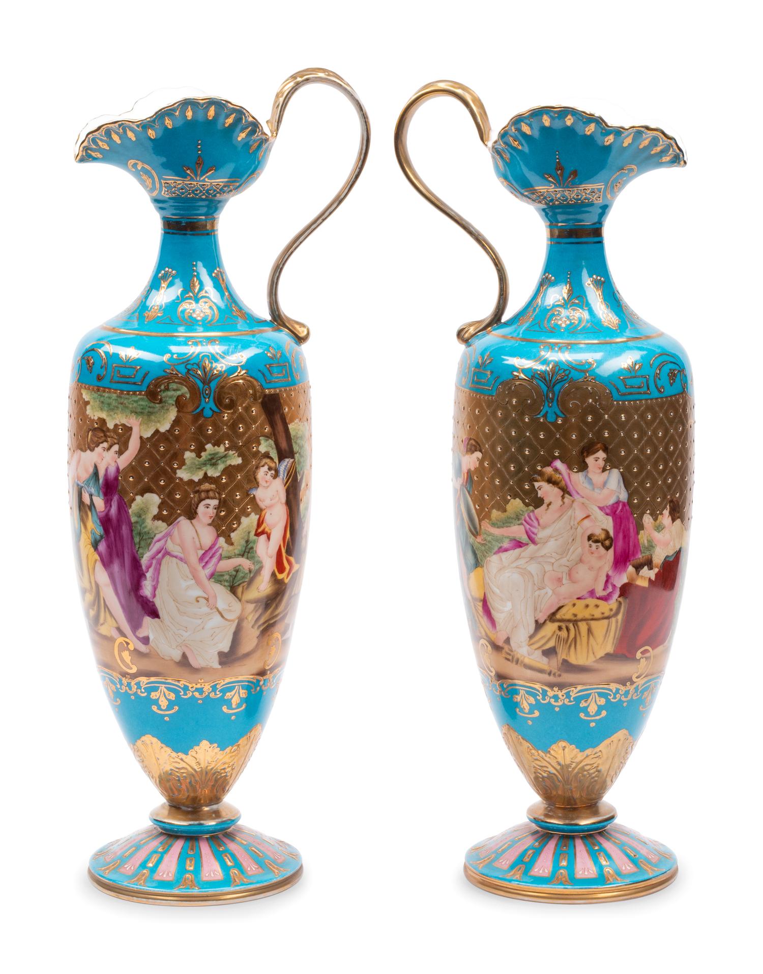 A Pair of Vienna Style Porcelain Ewers