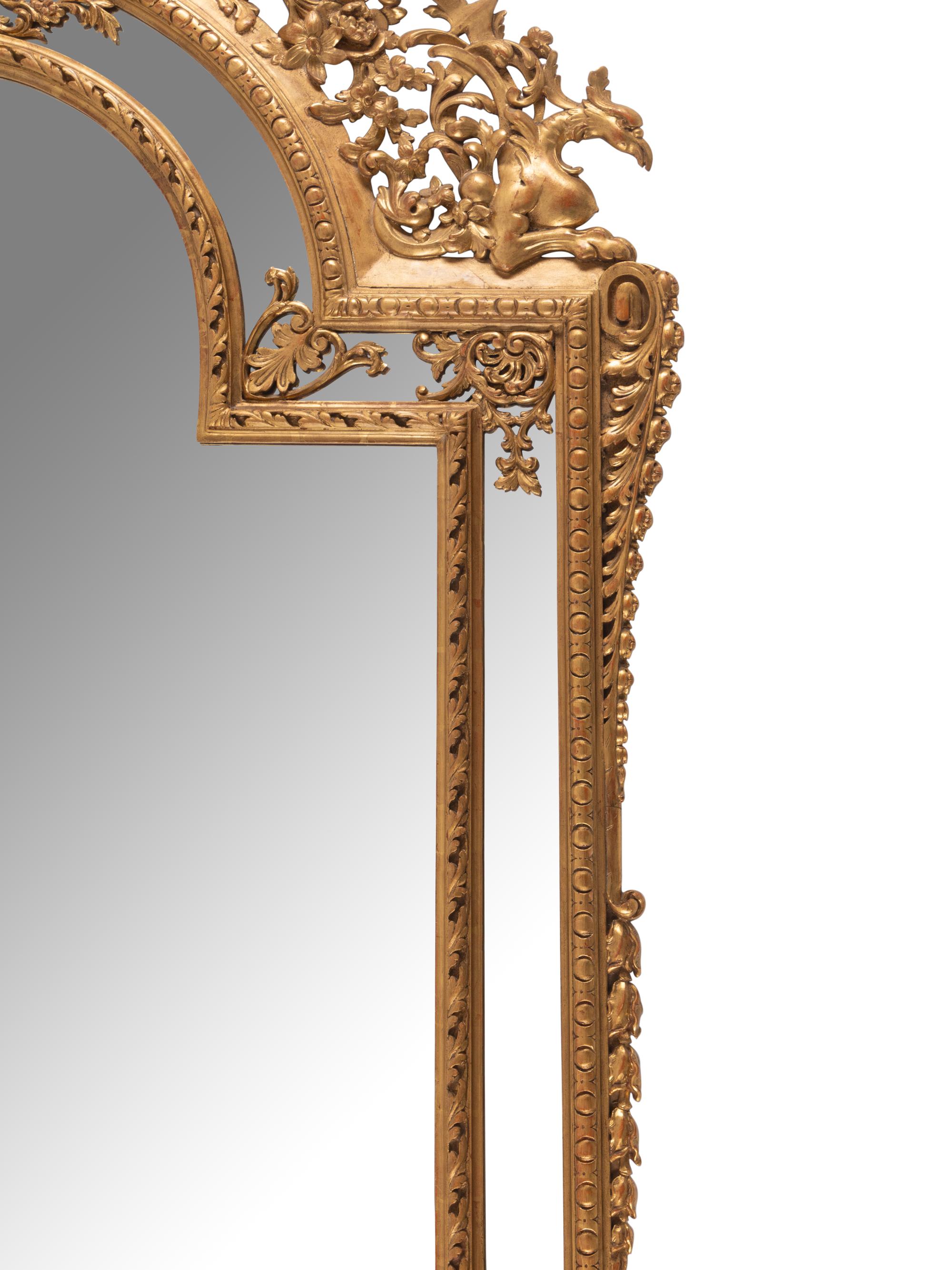 A Pair of Large Continental Neoclassical Style Giltwood Mirrors