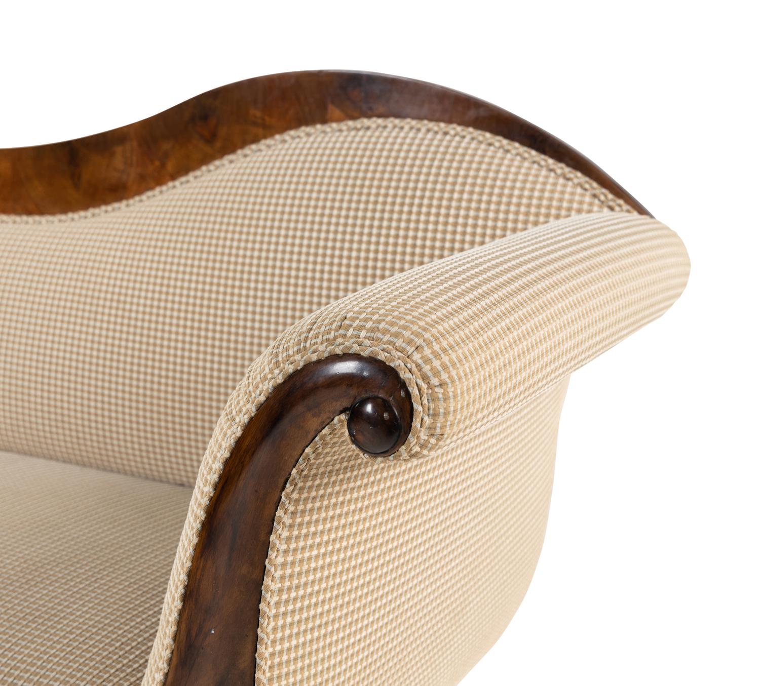 A Biedermeier Figured Walnut Sofa