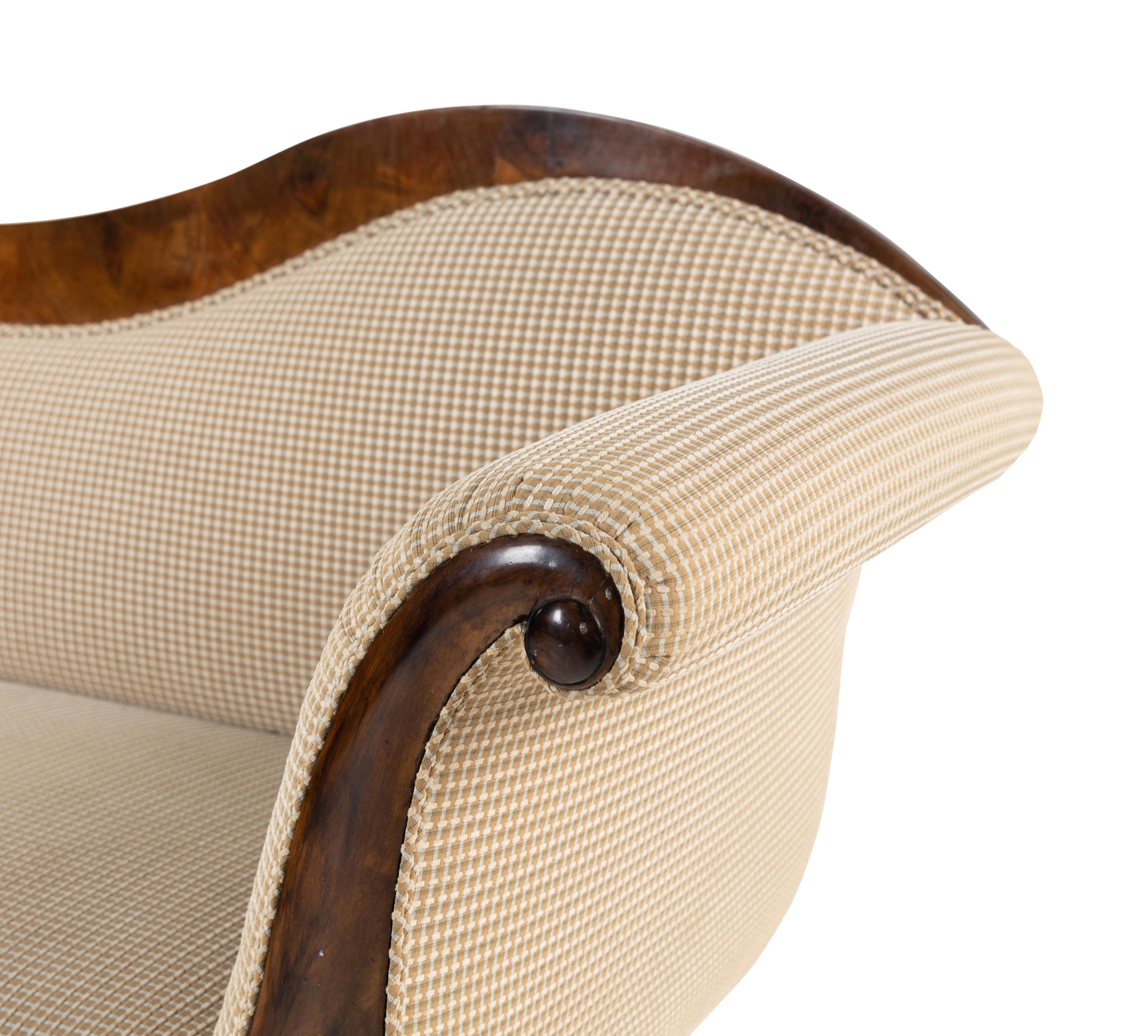 A Biedermeier Figured Walnut Sofa
