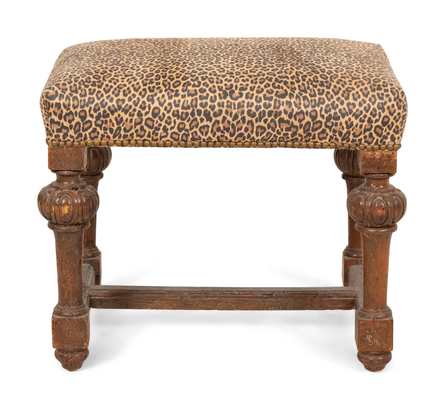 A Louis XIV Carved Walnut Tabouret with Leopard Print Upholstery