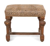 A Louis XIV Carved Walnut Tabouret with Leopard Print Upholstery