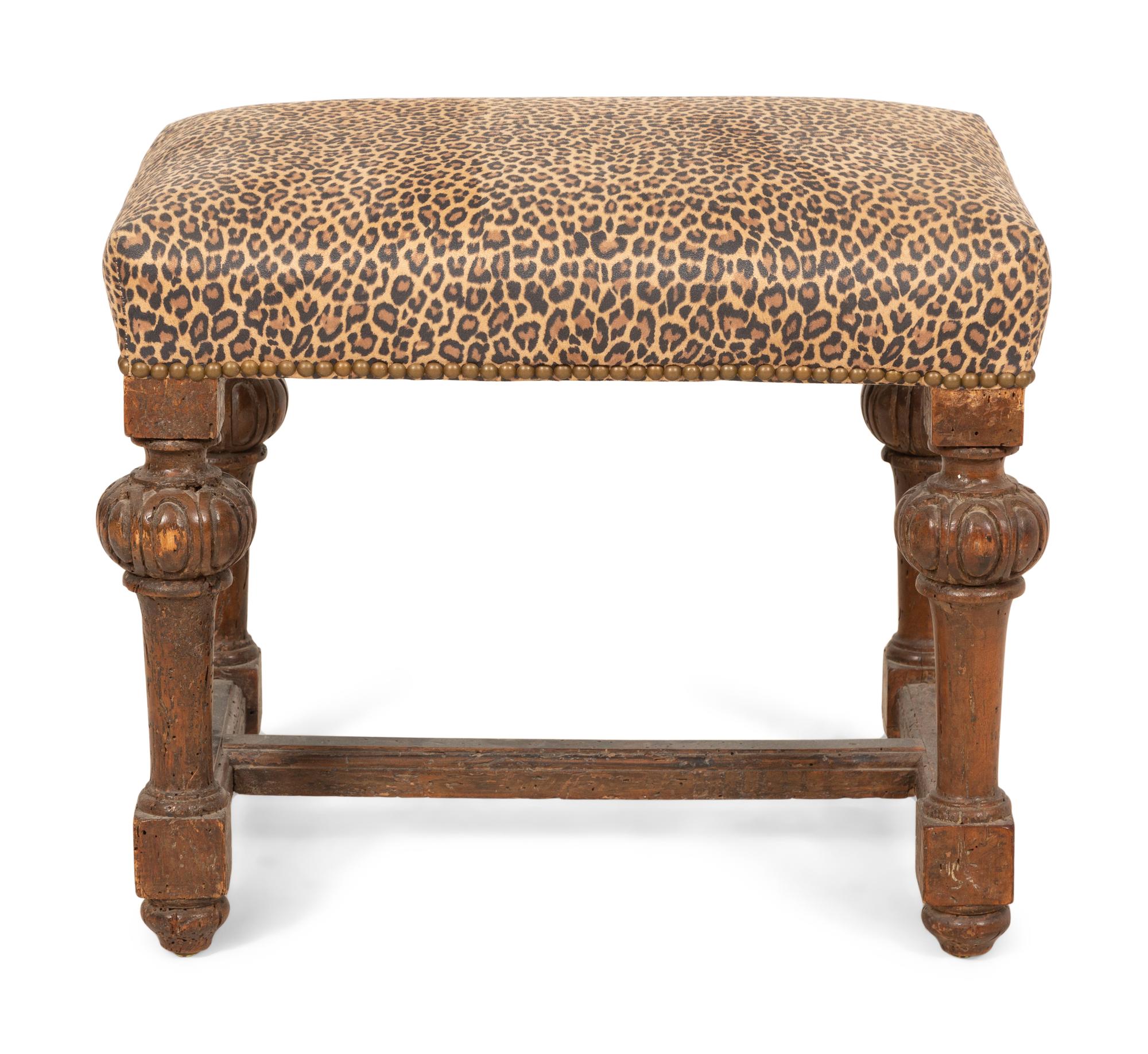 A Louis XIV Carved Walnut Tabouret with Leopard Print Upholstery