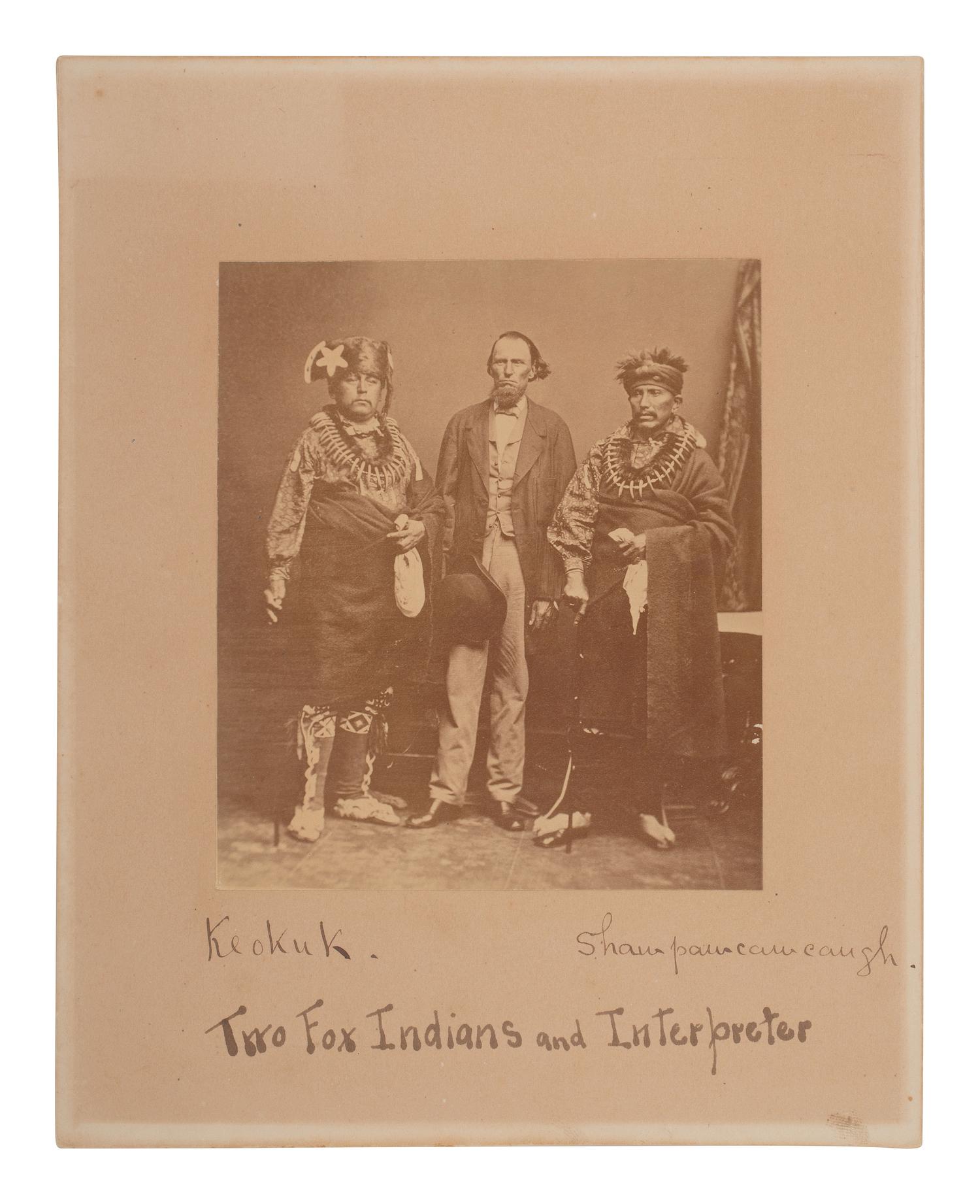 [BRADY, Mathew (ca 1822/1824-1896), photographer]. Albumen photograph of Moses Keokuk and Shawpawcawcaugh with white interpreter. [Topeka, KS, ca 1864].