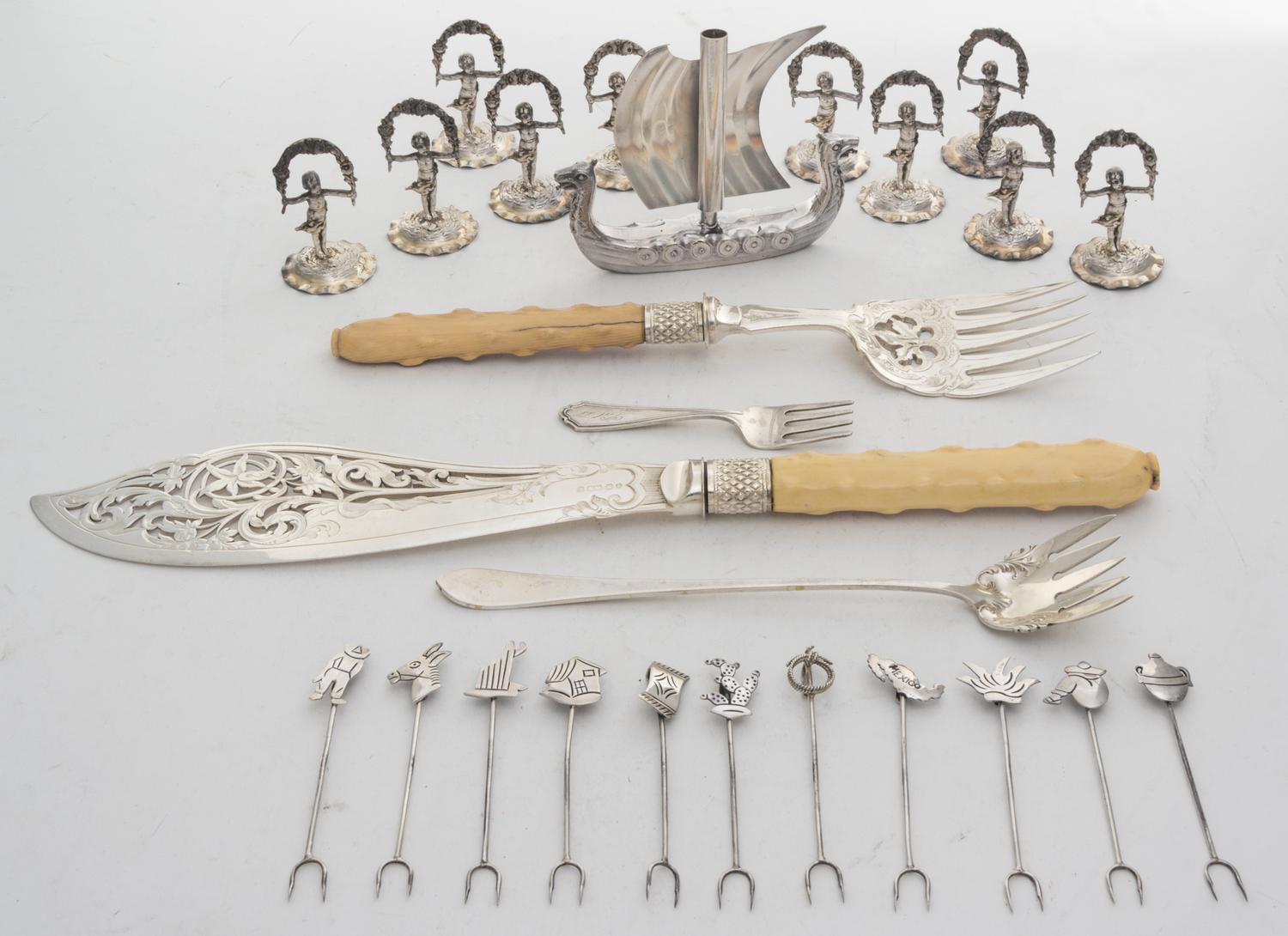 A Collection of Silver and Silver-plate Table Articles, various makers, comprising twelve silver olive picks, ten German silver place c