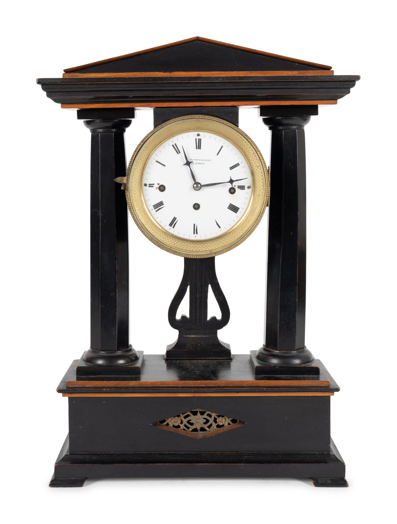 A German Ebonized Cherrywood and Gilt Bronze Mounted Architectural Mantel Clock