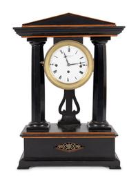 A German Ebonized Cherrywood and Gilt Bronze Mounted Architectural Mantel Clock