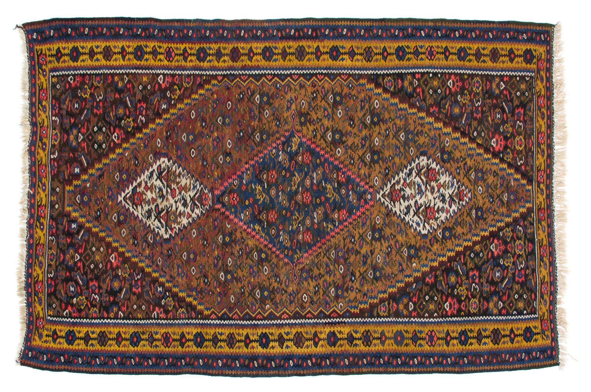 A Khilim Rug 5 feet x 3 feet 6 inches.