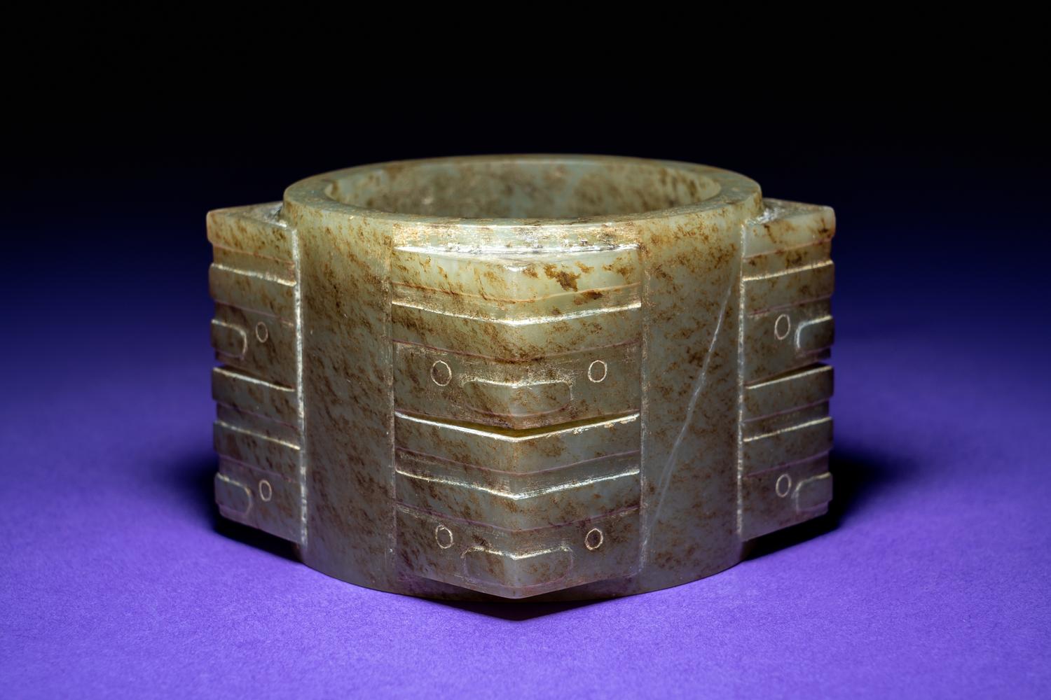 A Chinese Mottled Russet and Yellow Jade Cong