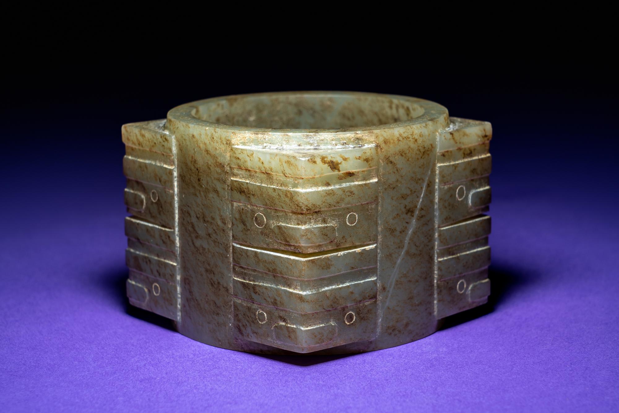 A Chinese Mottled Russet and Yellow Jade Cong