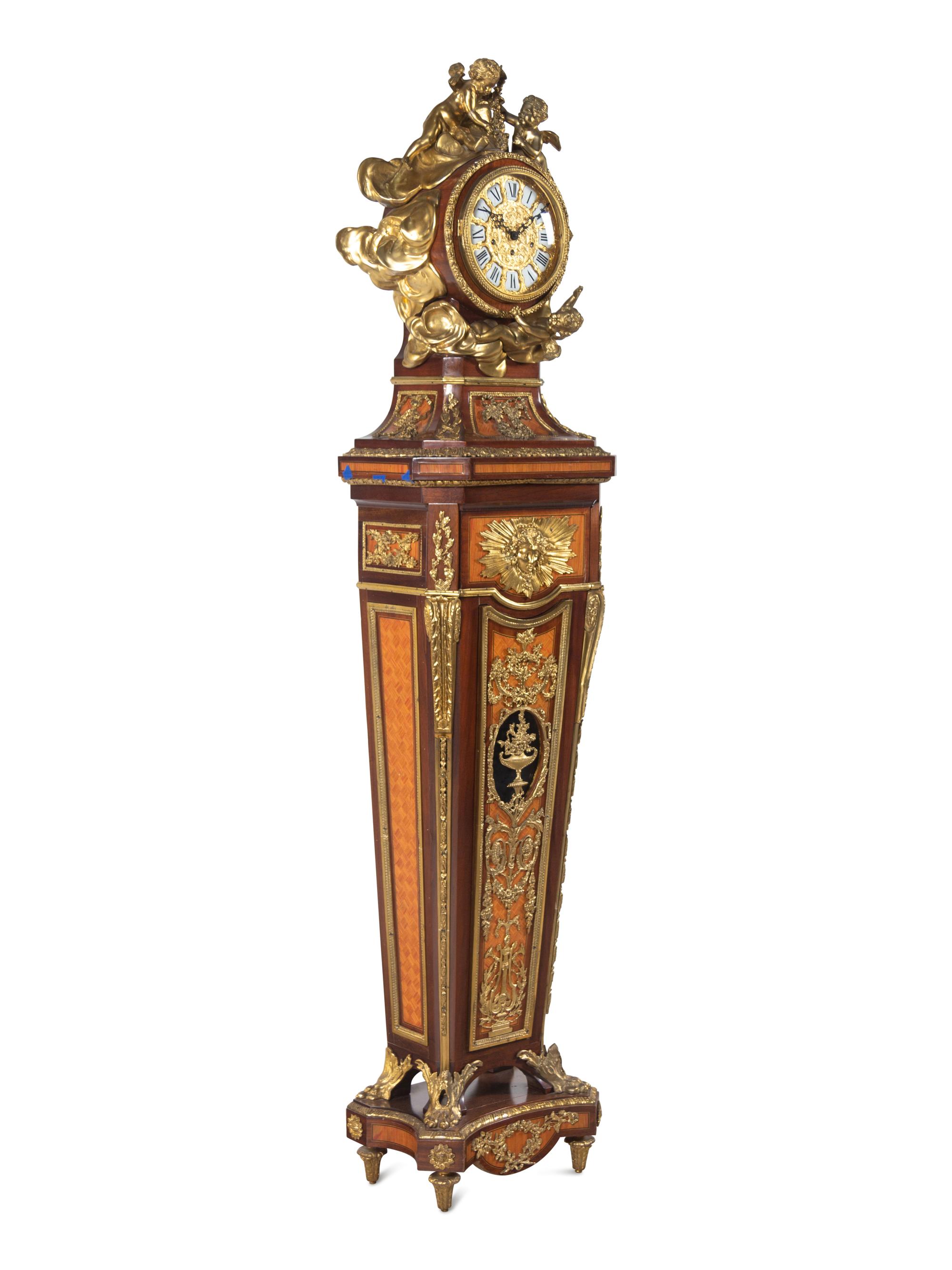 A Louis XVI Style Gilt Bronze Mounted Parquetry and Mahogany Régulateur de Pendule