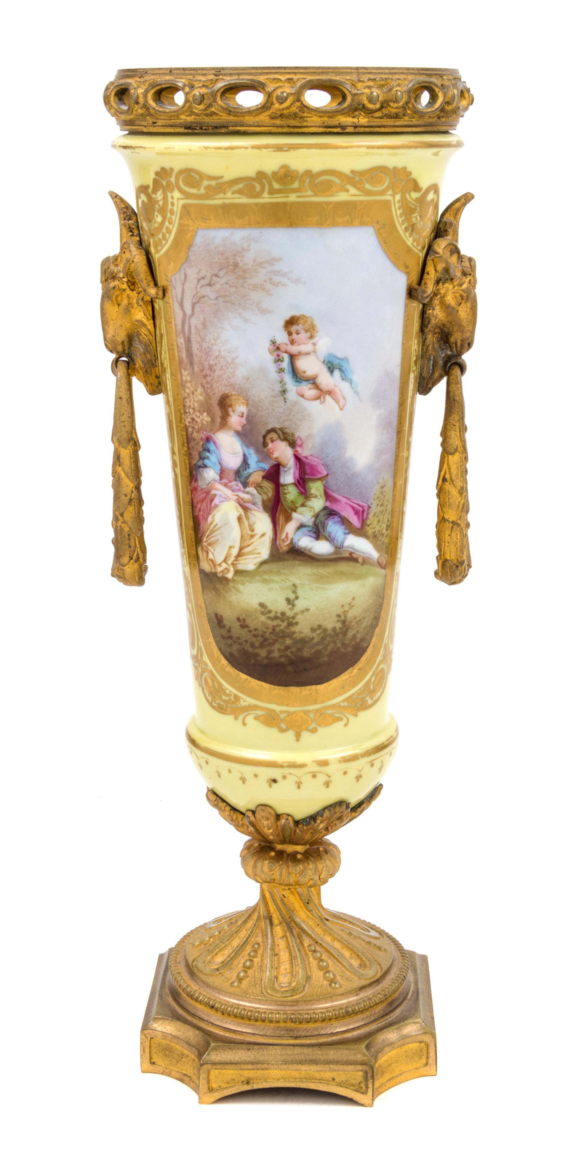 A Sevres Style Porcelain Urn Height 14 1/4 inches.