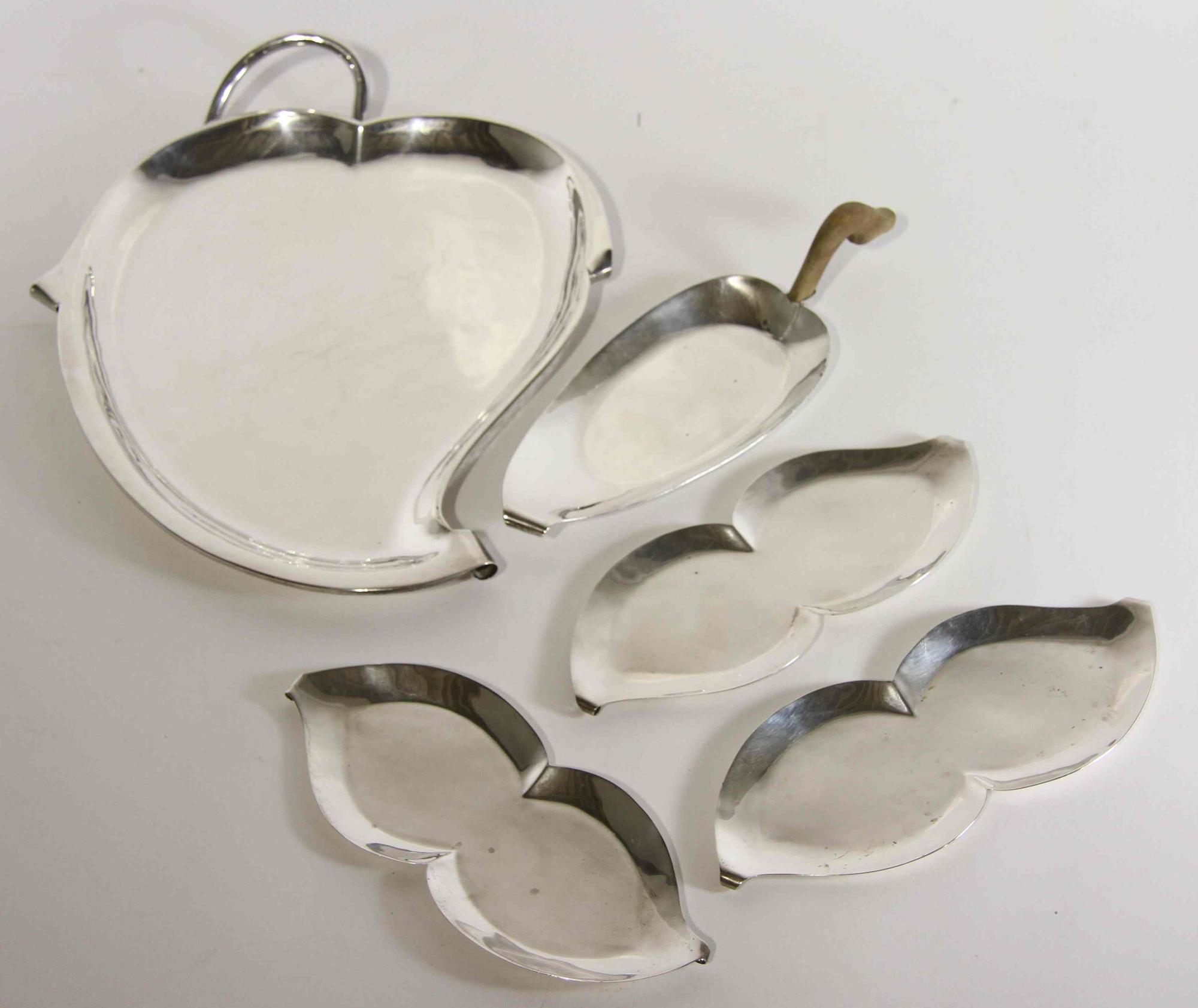 A Group of Five Mexican Silver Serving Trays, Royal Haeger by Royal Hickman, 20th Century, comprising a leaf form tray and four serving