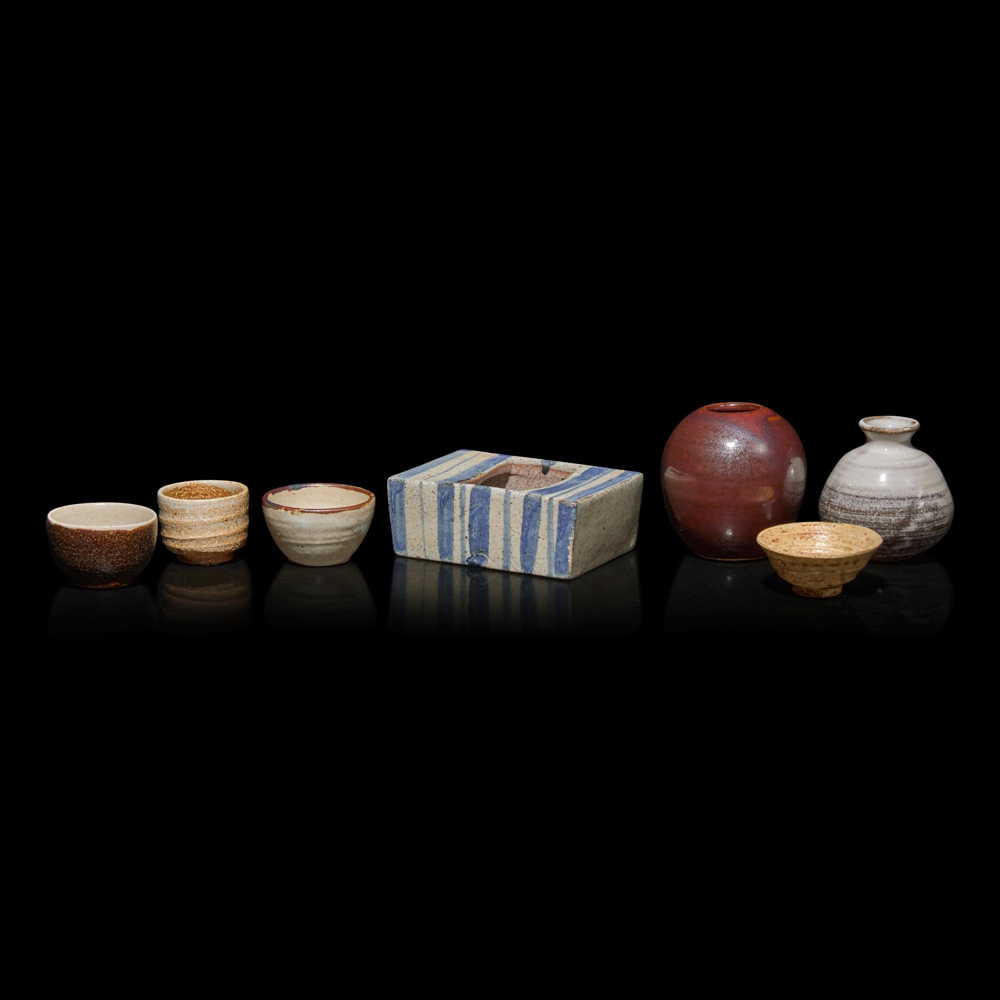 A Group of Seven Assorted Japanese Sake Cups, Small Vases, and a Rectangular Vessel, 20th Century