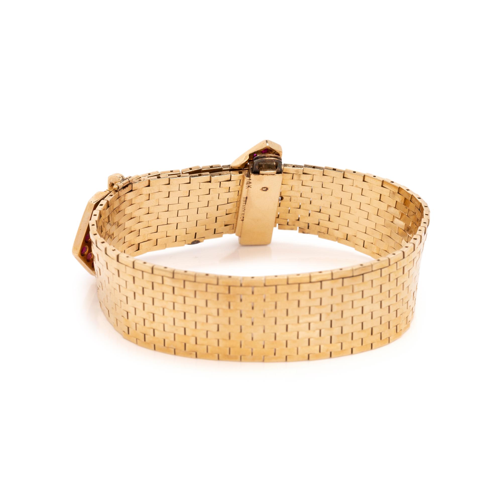 TIFFANY & CO., RETRO, YELLOW GOLD, RUBY AND DIAMOND BELT MOTIF BRACELET
