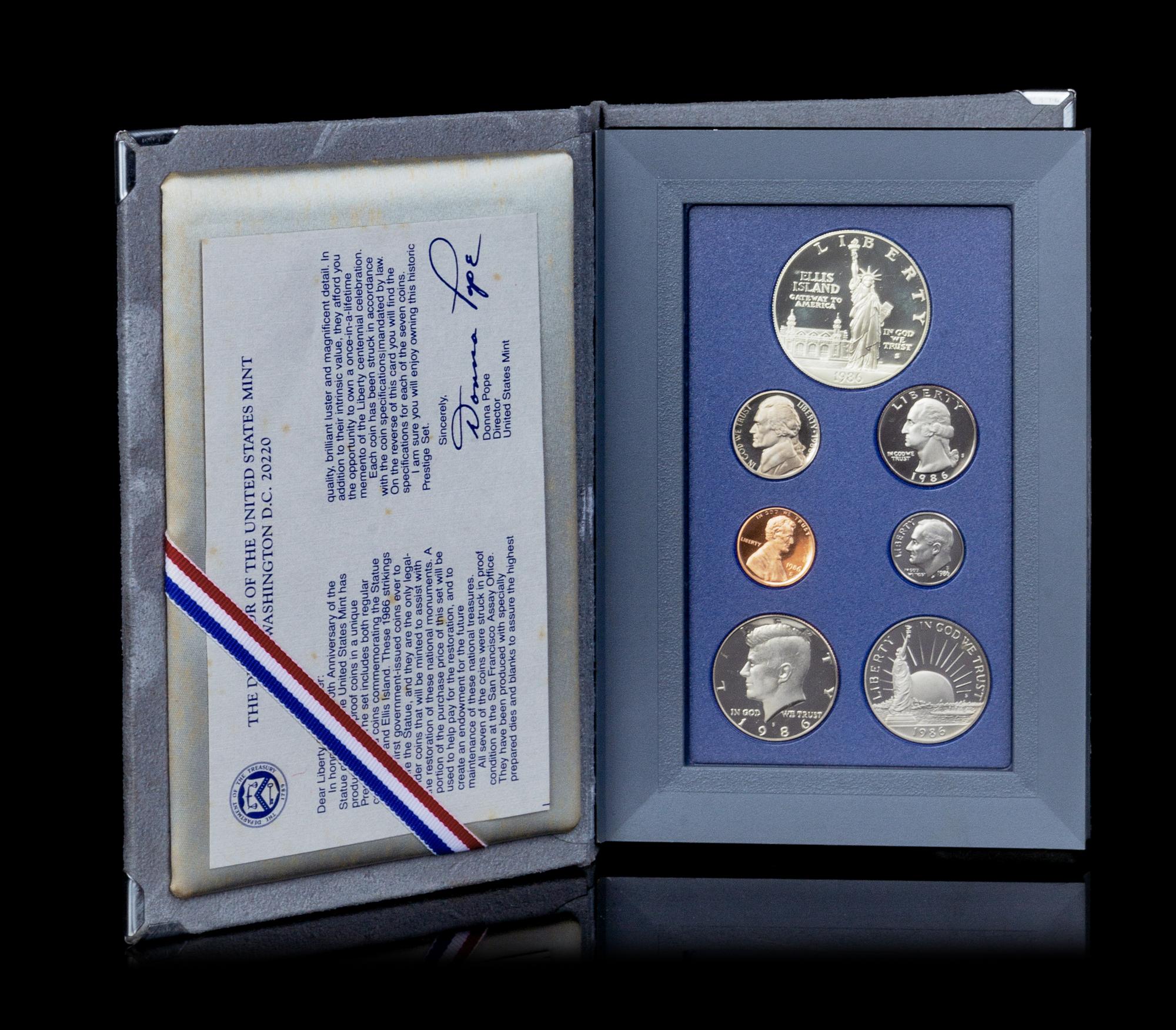*A United States 1986 Prestiege Seven-Coin Proof Set
