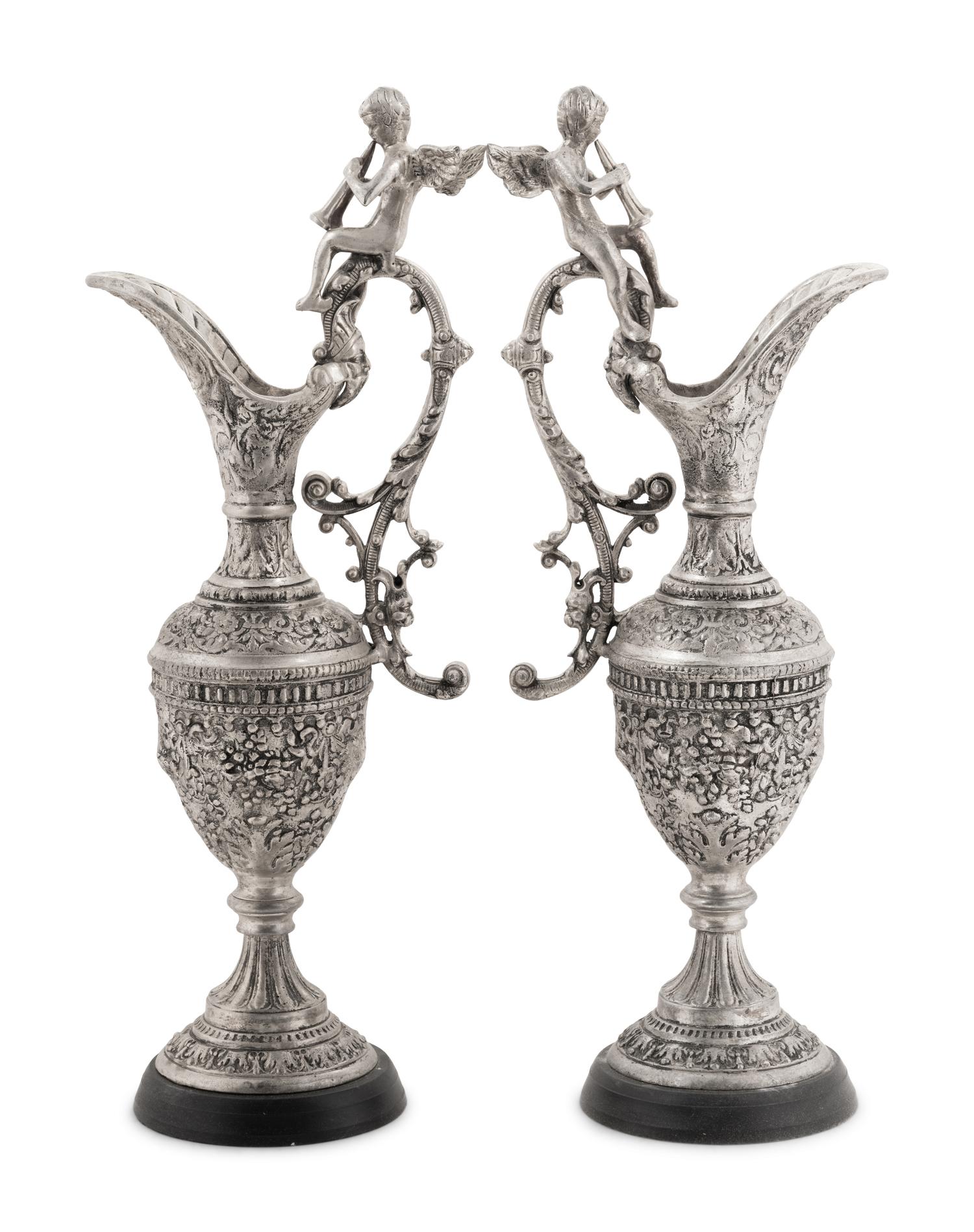 A Pair of Neoclassical Style White Metal Ewers