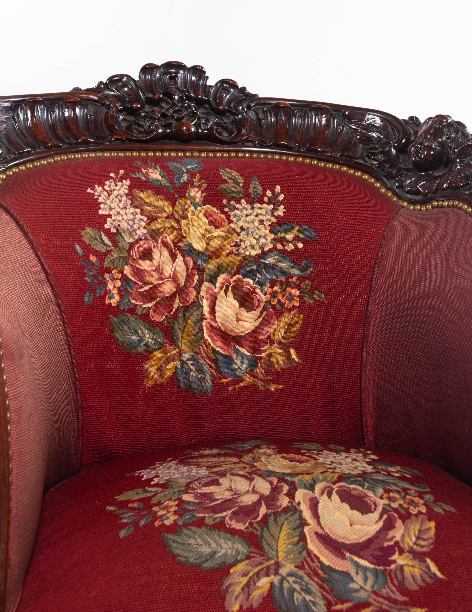A Rococo Revival Carved Walnut Three-Piece Seating Suite in the Style of Karpen