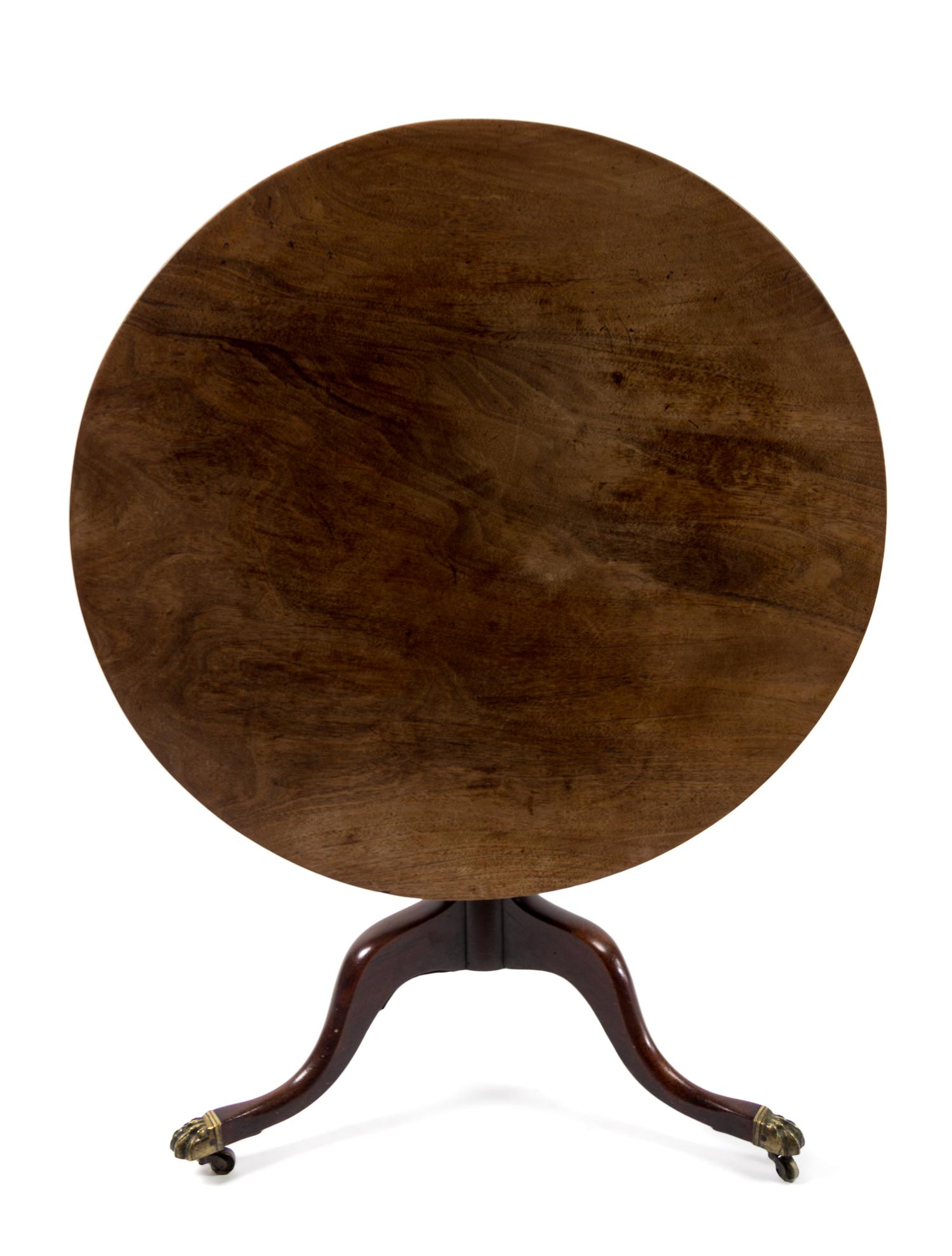A George III Style Tilt-Top Table Height of first 29 x diameter 39 inches. — 19TH CENTURY
