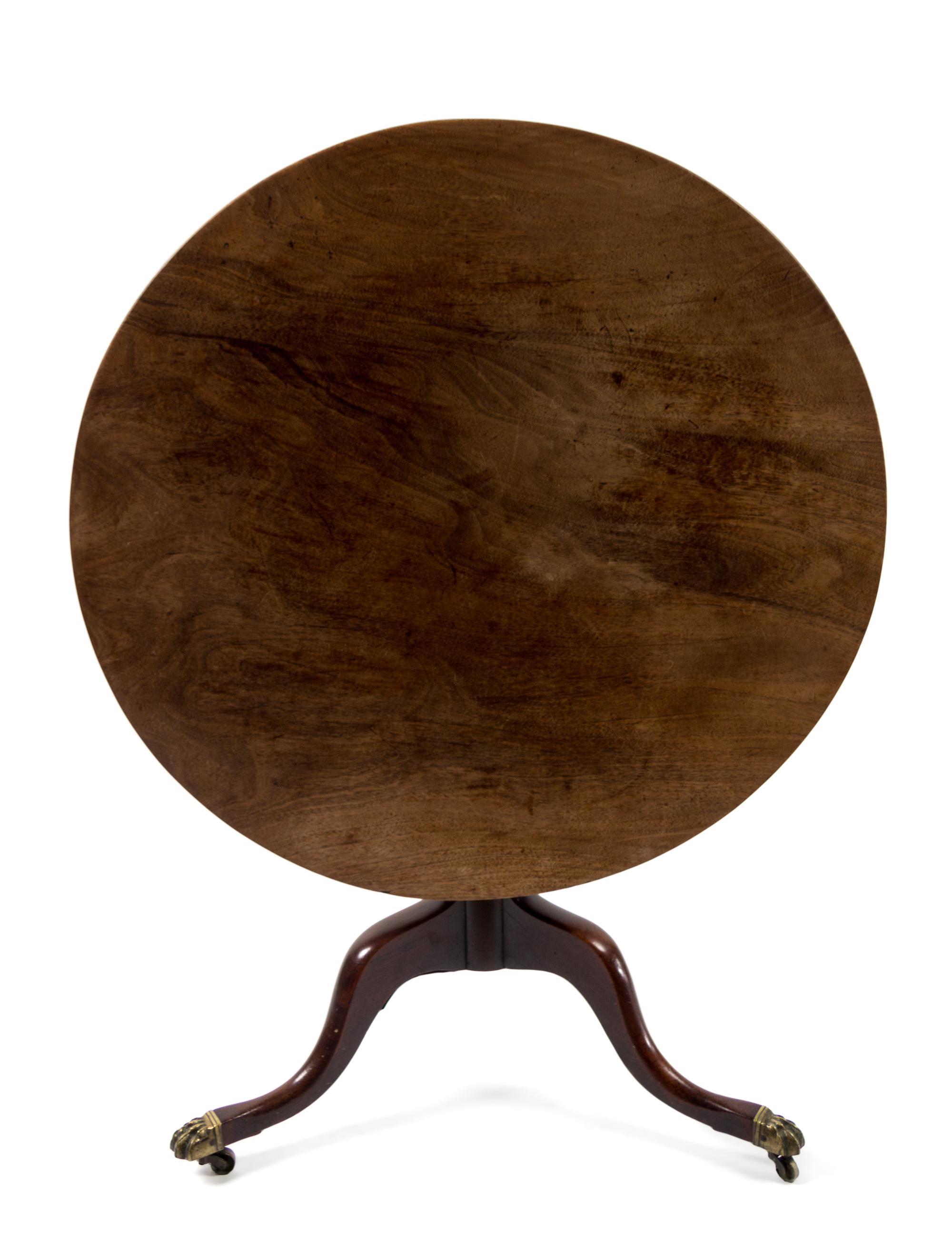 A George III Style Tilt-Top Table Height of first 29 x diameter 39 inches. — 19TH CENTURY