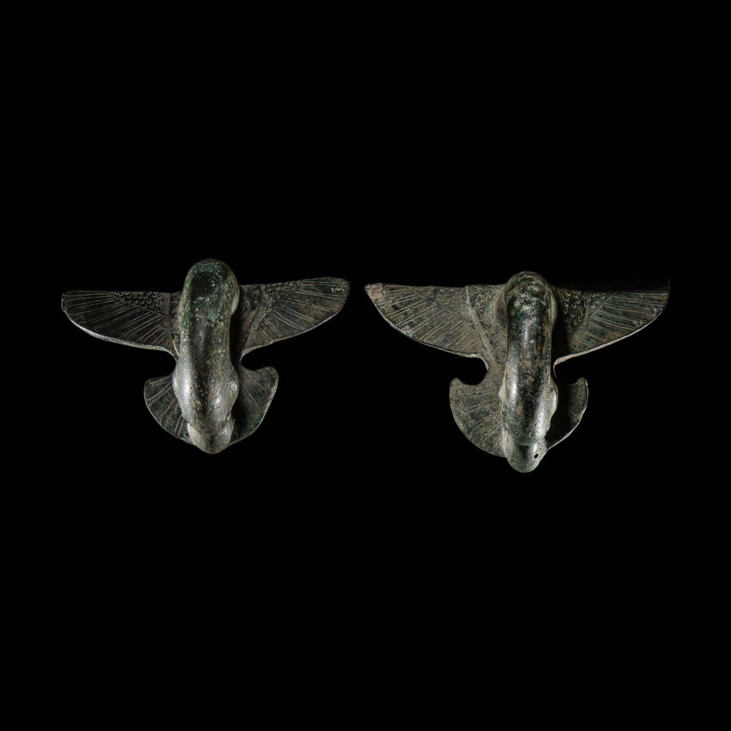 A Pair of Etruscan Bronze Vessel Handles