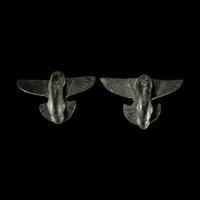 A Pair of Etruscan Bronze Vessel Handles