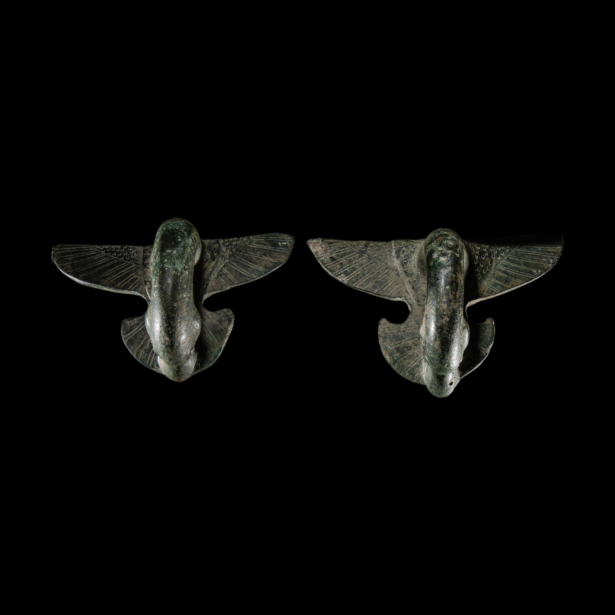 A Pair of Etruscan Bronze Vessel Handles