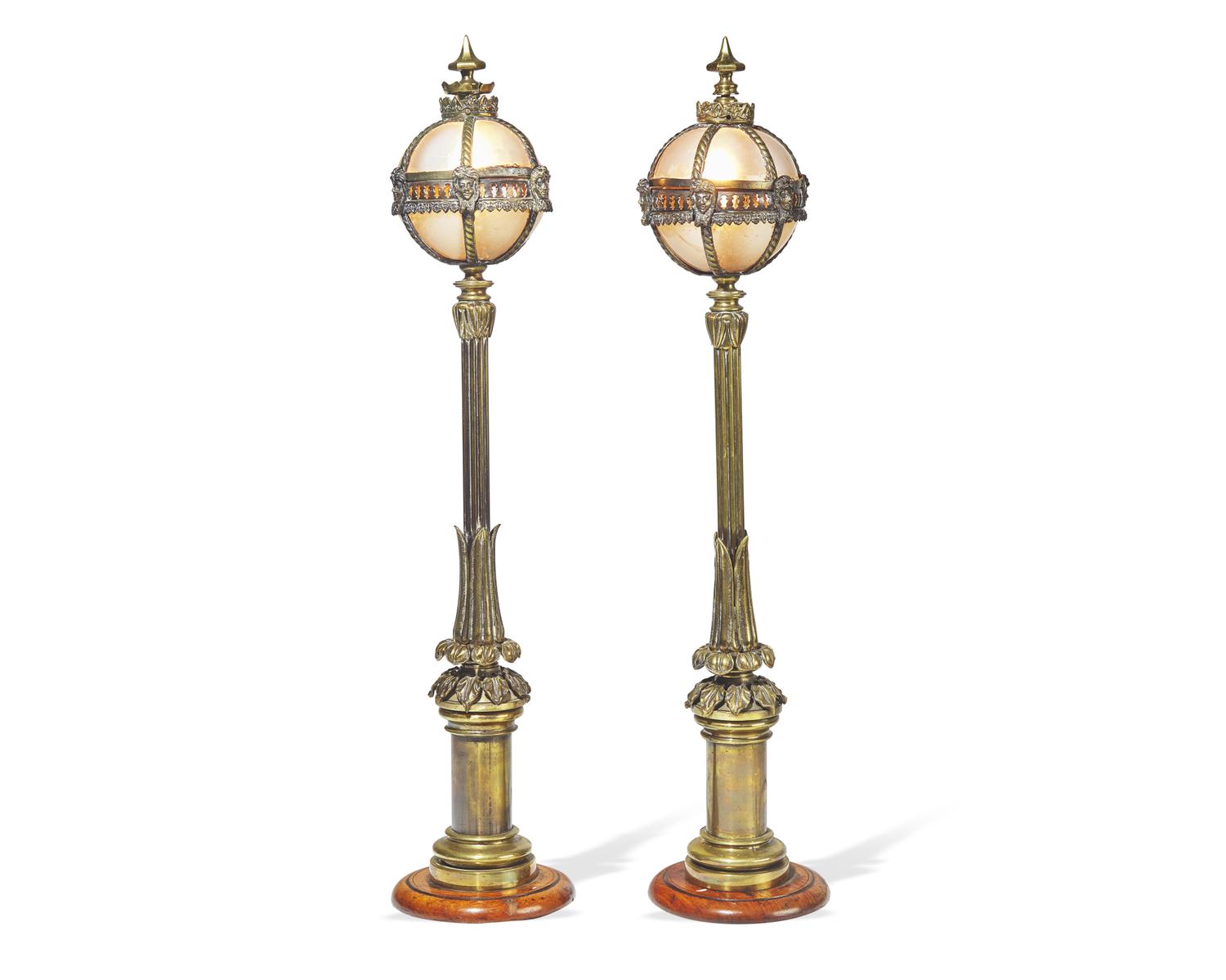 A pair of Belle Epoque gilt bronze and walnut table lamps in the form of miniature street lamps, late 19th century