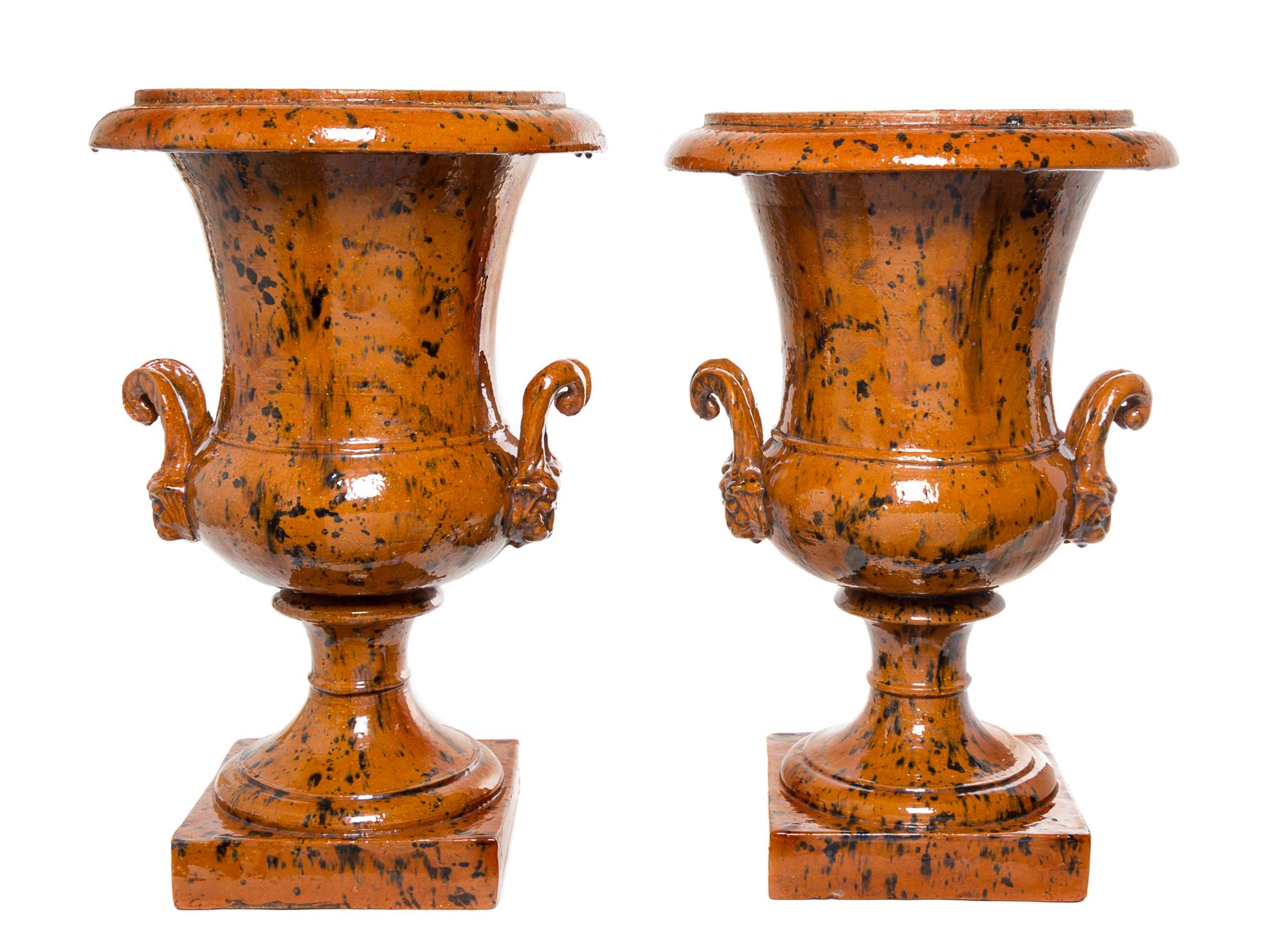 A Pair of Glazed Ceramic Urns Height 21 3/4 inches. — 20TH CENTURY